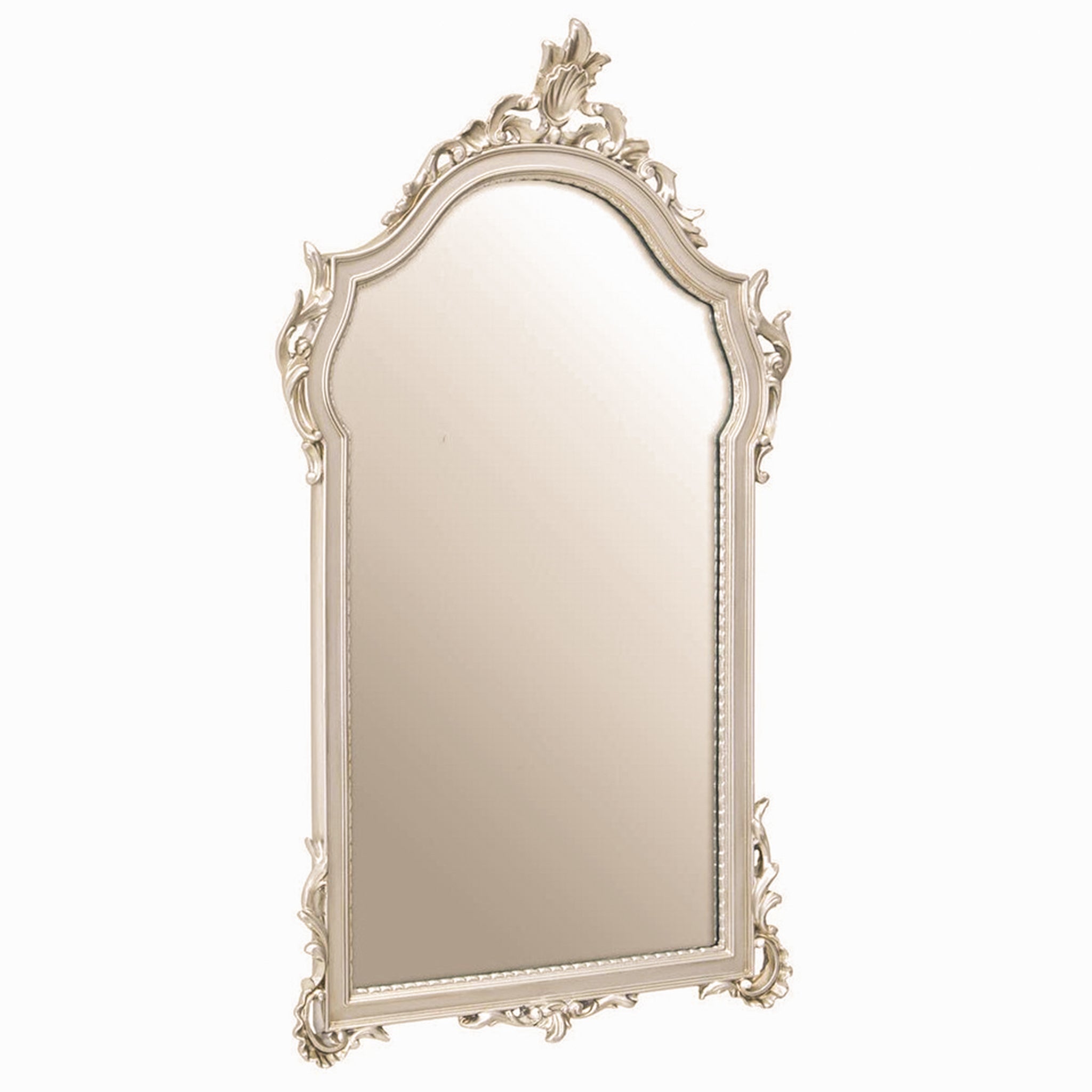 Angled view of the Aurelia wall mirror with a decorative silver frame finish, showcasing the elegant arched silhouette, ornate carved detailing and timeless French-inspired design for luxury interiors.