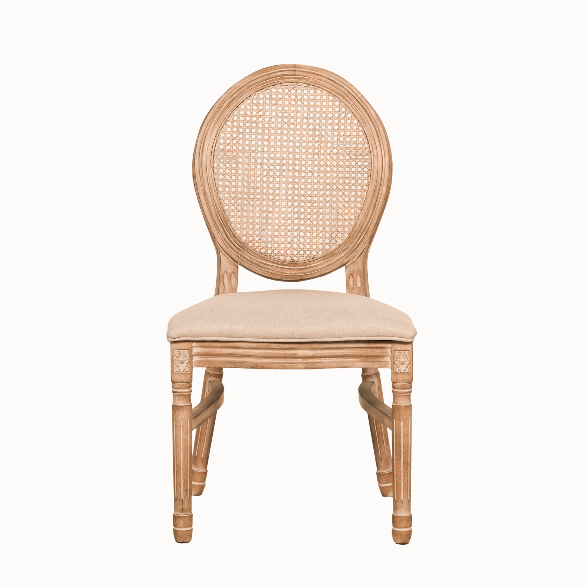 Front profile of the Camille French Louis Linen Upholstered Dining Chair with carved wooden frame, woven cane backrest, linen seat cushion and classic Louis-style silhouette on a white background.