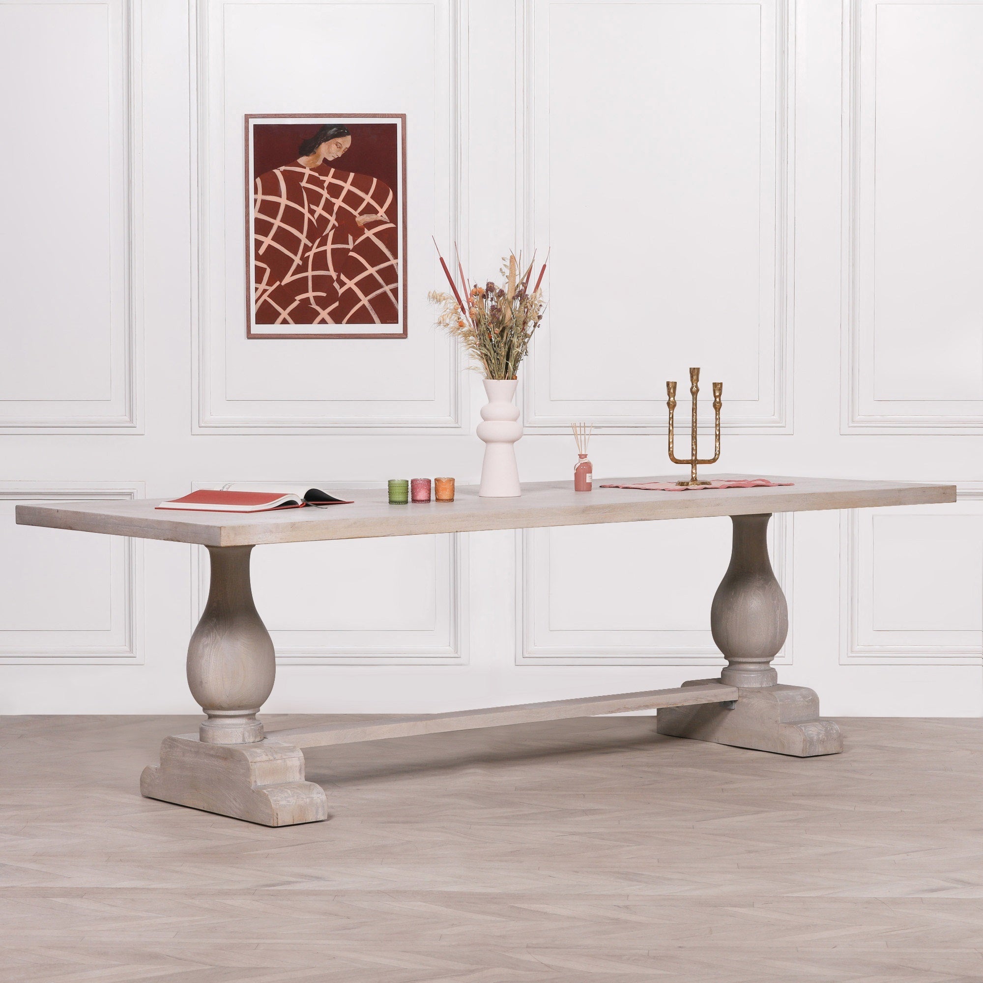 Camille Large Rectangular Dining Table 260cm for 10–12 in Bleached Mango Wood styled with decorative accessories, showcasing the spacious solid mango wood tabletop, double pedestal trestle base and contemporary natural finish, ideal for large family dining rooms, entertaining and luxury farmhouse interiors.