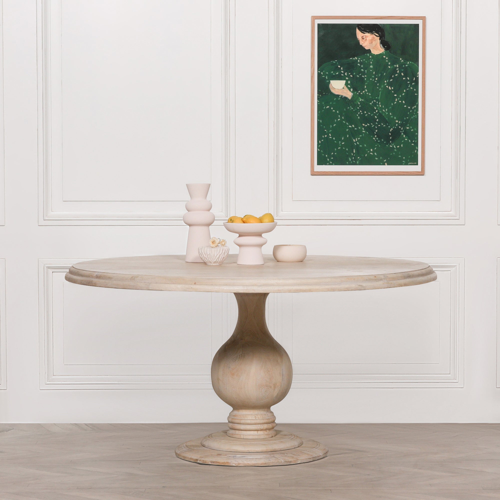 Camille Round Pedestal Dining Table 152cm for 6 in Bleached Mango Wood styled with contemporary decorative accessories, showcasing the spacious round tabletop, sculptural pedestal base and natural wood grain, ideal for modern farmhouse, Scandinavian and coastal dining room interiors.