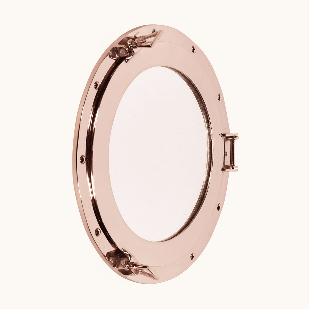 Marin Extra-Large Porthole Round Accent Wall Mirror with a highly polished aluminium frame, circular mirrored centre, exposed rivet details, hinge and nautical-style locking clasps.