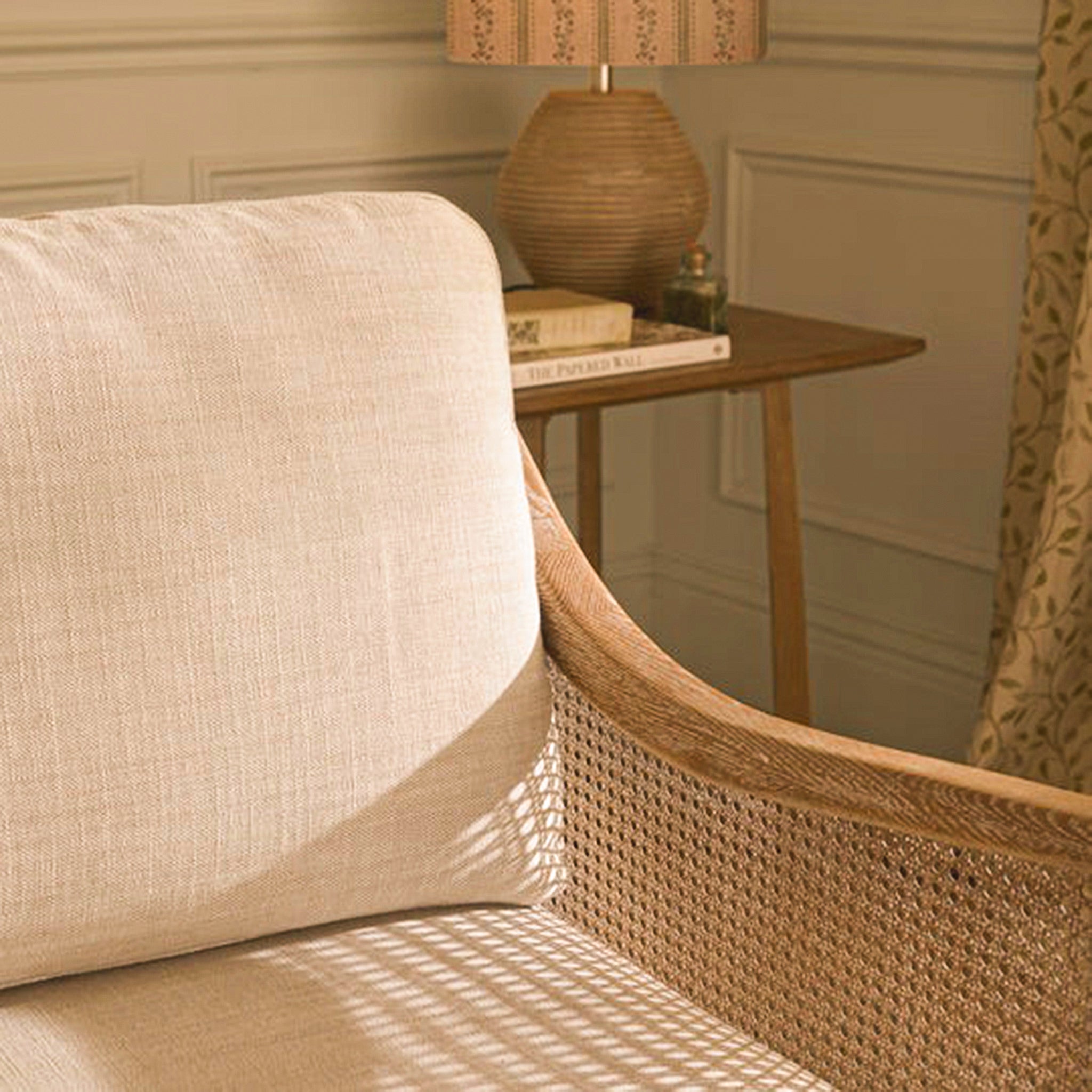 Elara Rattan Accent Chair – Linen Upholstered Seat