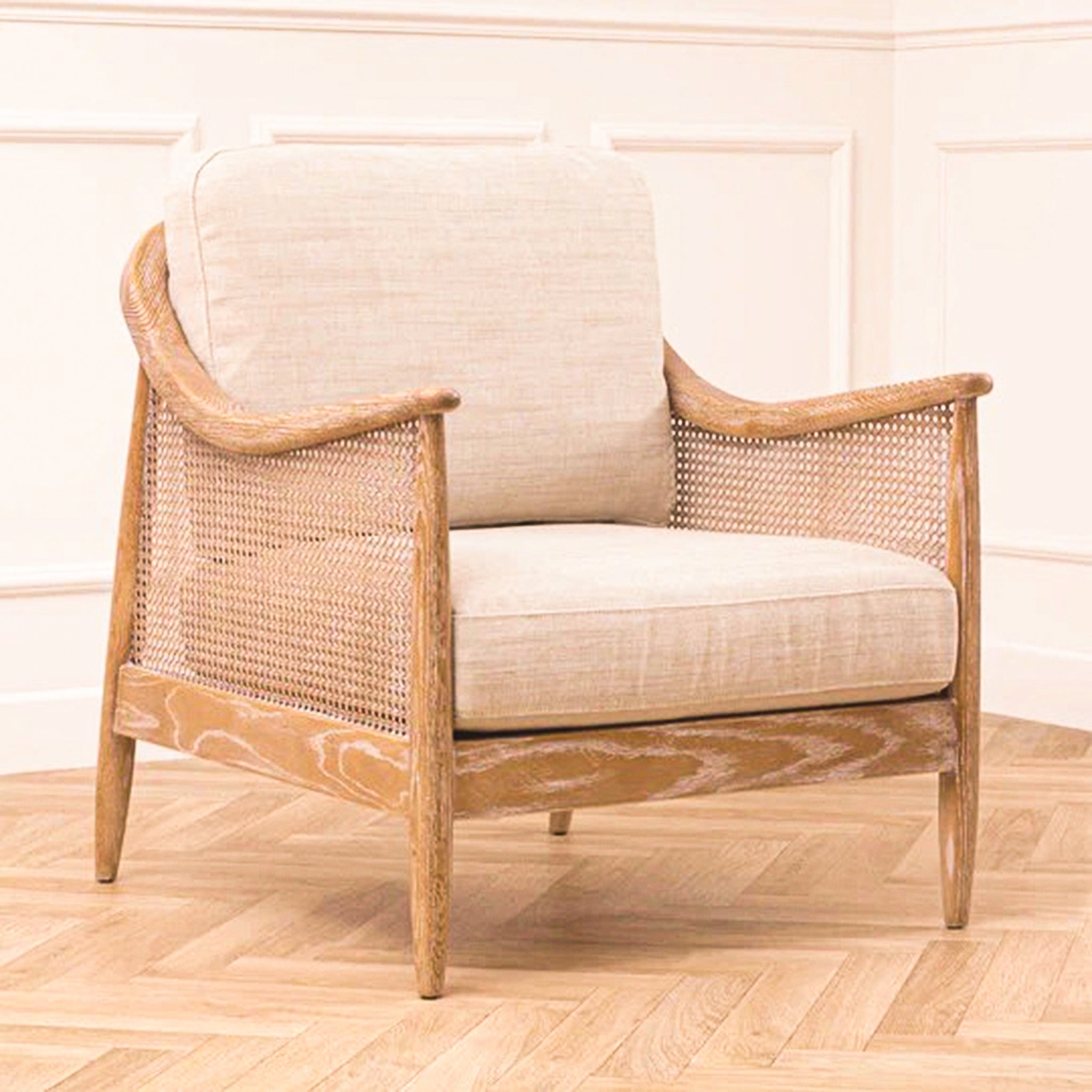 Elara Rattan Accent Chair – Linen Upholstered Seat