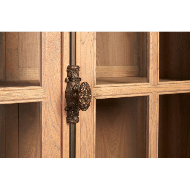 Close-up of the Alaric Tall Oak Wood Display Cabinet featuring the decorative antique-style iron espagnolette door handle, glazed oak cabinet doors and beautifully crafted solid oak frame.