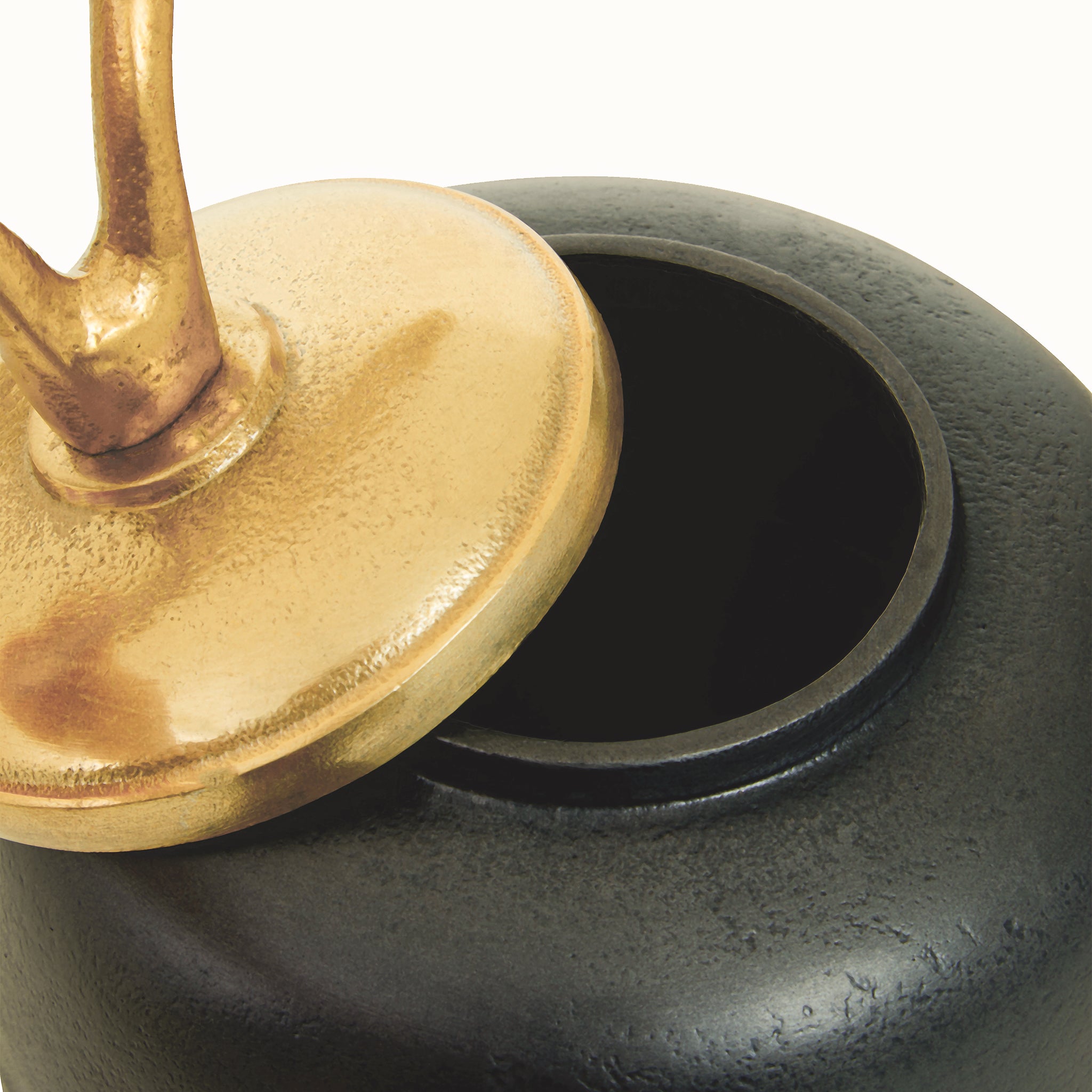 Close-up of the Alix Round Grey Aluminium Ginger Jar with its gold ginkgo leaf lid removed, revealing the jar opening and contrasting dark grey textured aluminium finish.