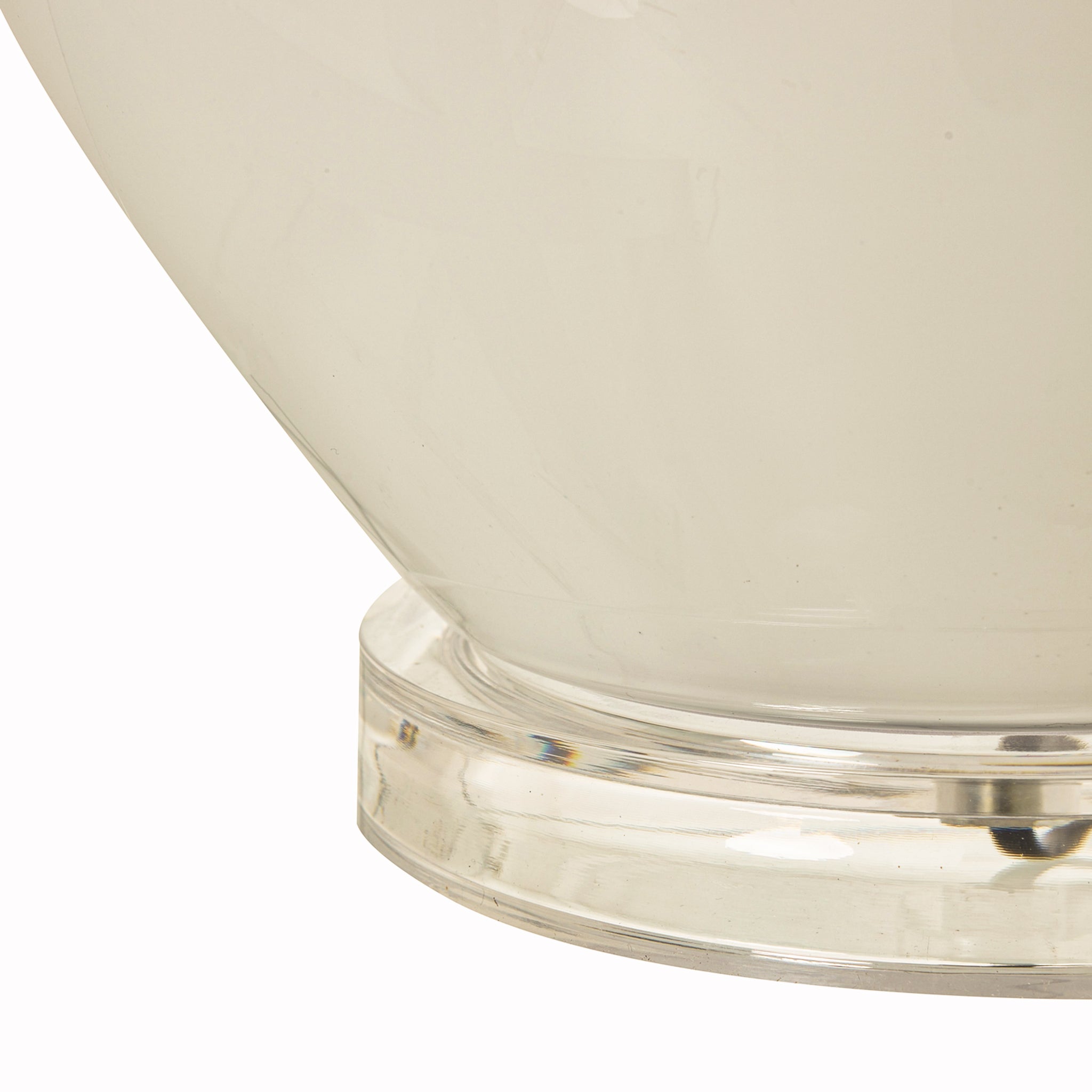 Close-up of the clear acrylic base and smoked grey glass body on the Amélie Grey Glass Table Lamp showcasing the modern layered construction and premium finish.