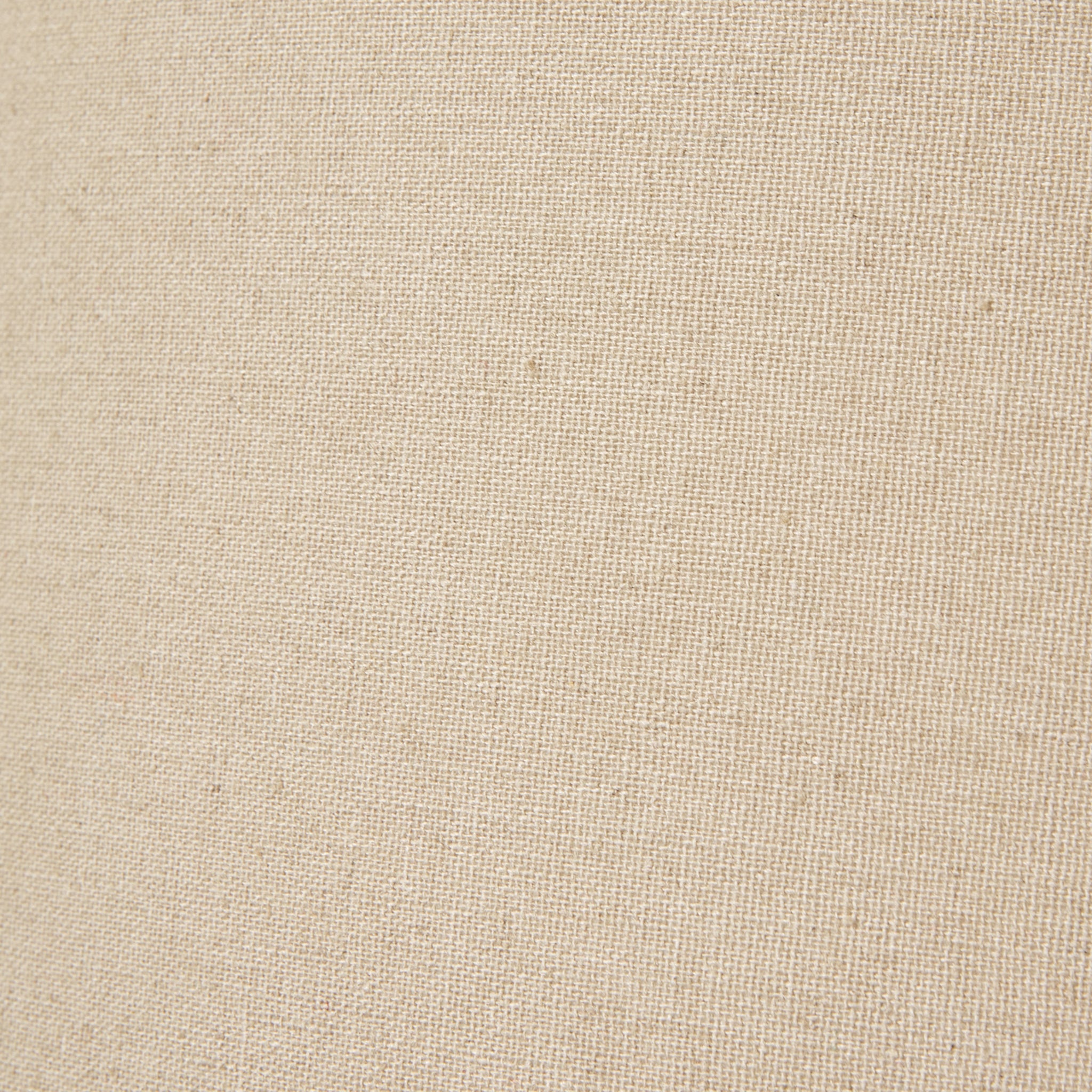 Close-up of the natural linen lampshade fabric on the Amélie Grey Glass Table Lamp highlighting the woven linen texture, neutral colour and quality craftsmanship for timeless interior lighting.