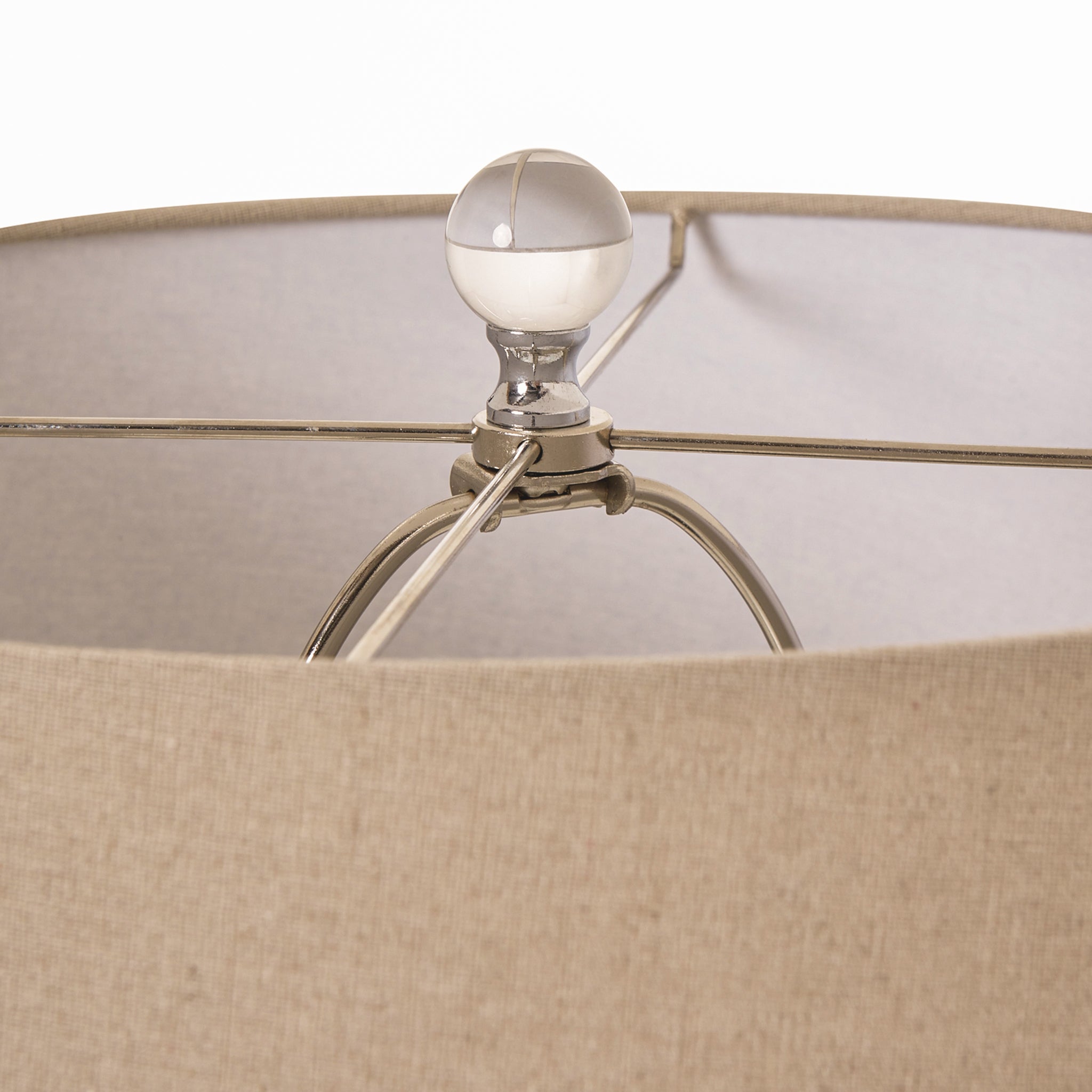 Close-up of the Amélie Grey Glass Table Lamp with linen shade showing the polished finial, metal frame and premium linen drum lampshade construction.