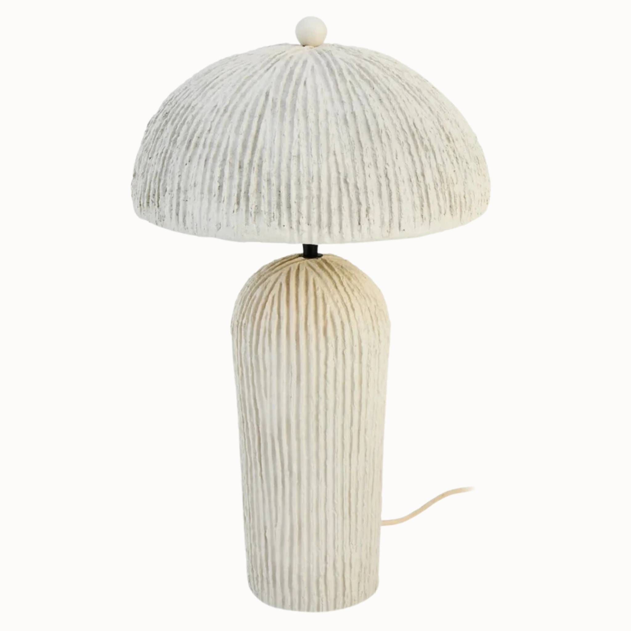 Oatmeal papier mâché domed table lamp with etched linear detail on a plain white background.