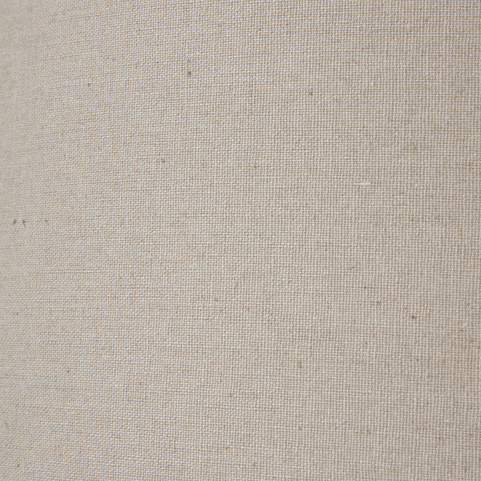 Close-up of Amélie table lamp natural linen shade showing the woven beige fabric texture on a white background.