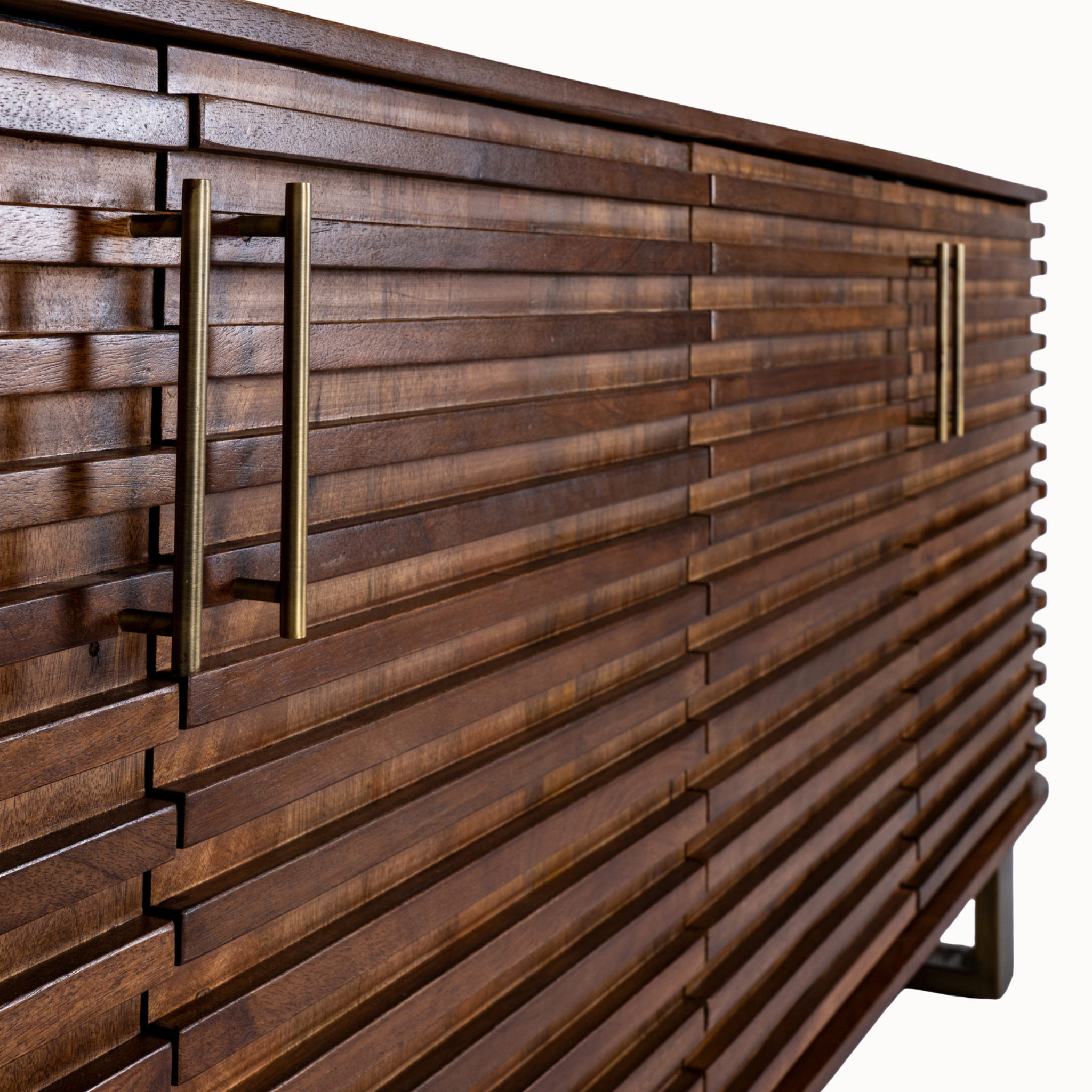 Close-up of Arsène brown wood sideboard showing textured ribbed doors and long gold metal handles on a white background.
