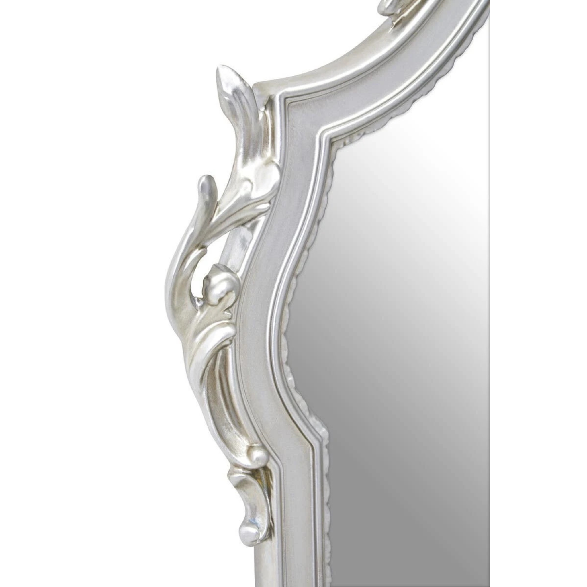 Close-up of Aurelia silver wall mirror side frame showing curved scrollwork and moulded detailing on white.
