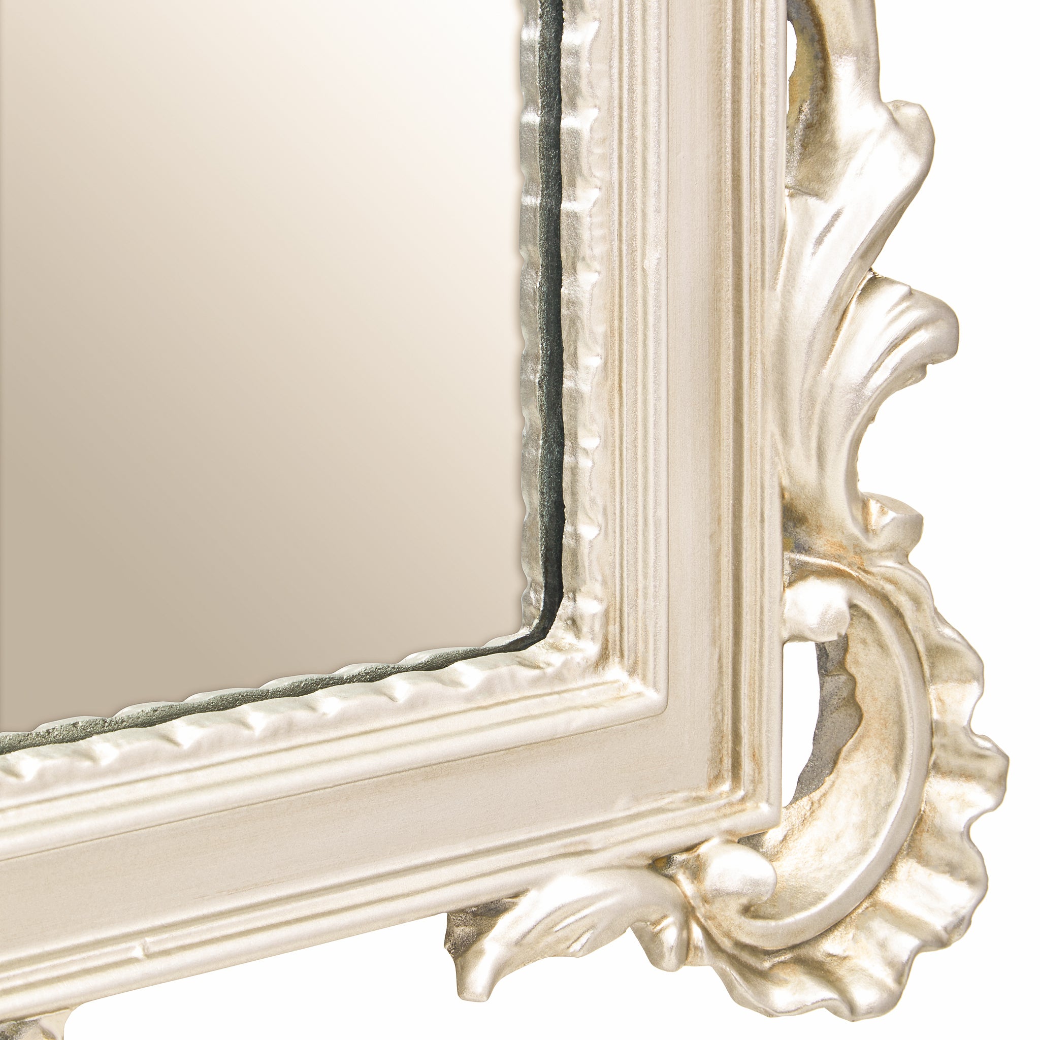 Close-up of the Aurelia wall mirror corner highlighting the silver frame finish, intricate carved scrollwork, decorative moulding and refined French-inspired craftsmanship.