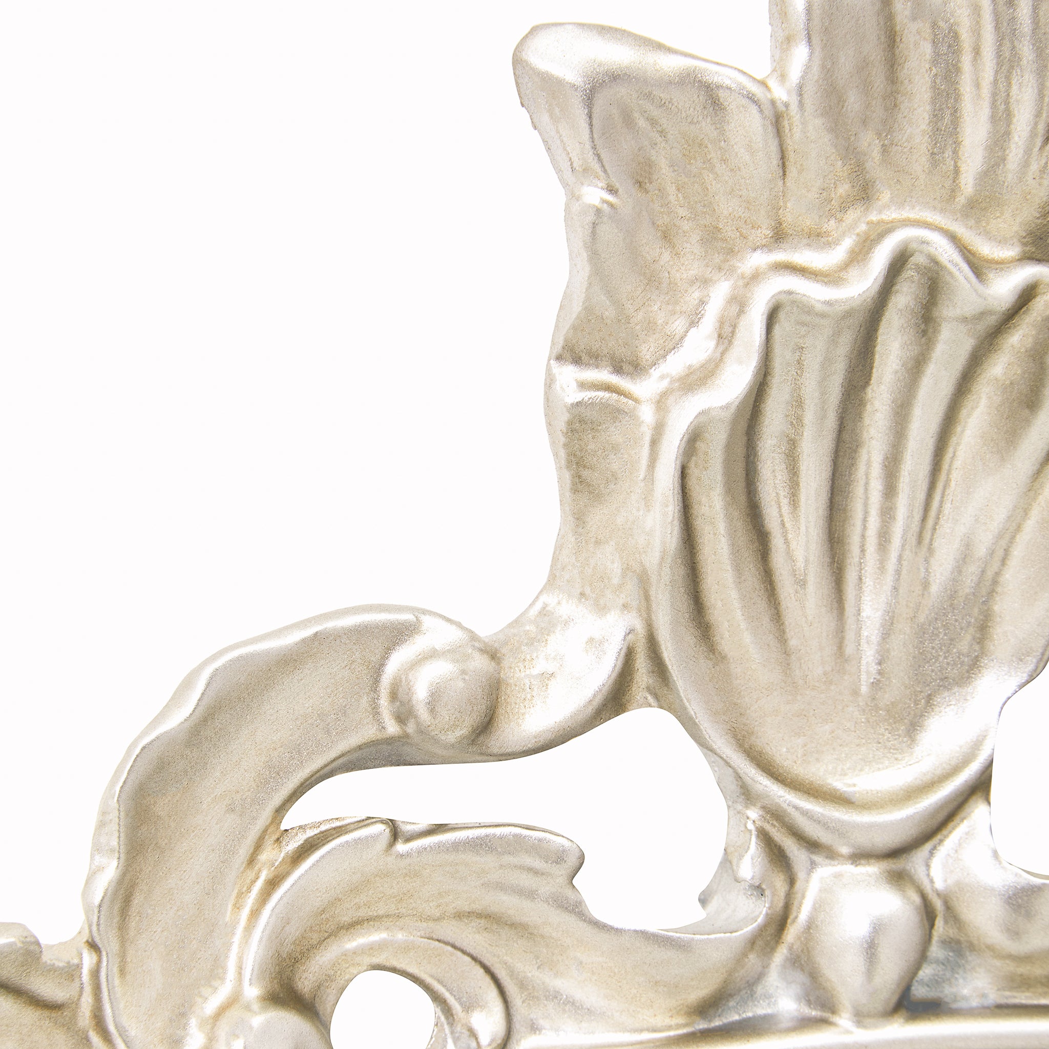 Close-up of the Aurelia wall mirror highlighting the ornate silver frame finish, decorative crest, sculpted Rococo-inspired scrollwork and handcrafted ornamental detailing.