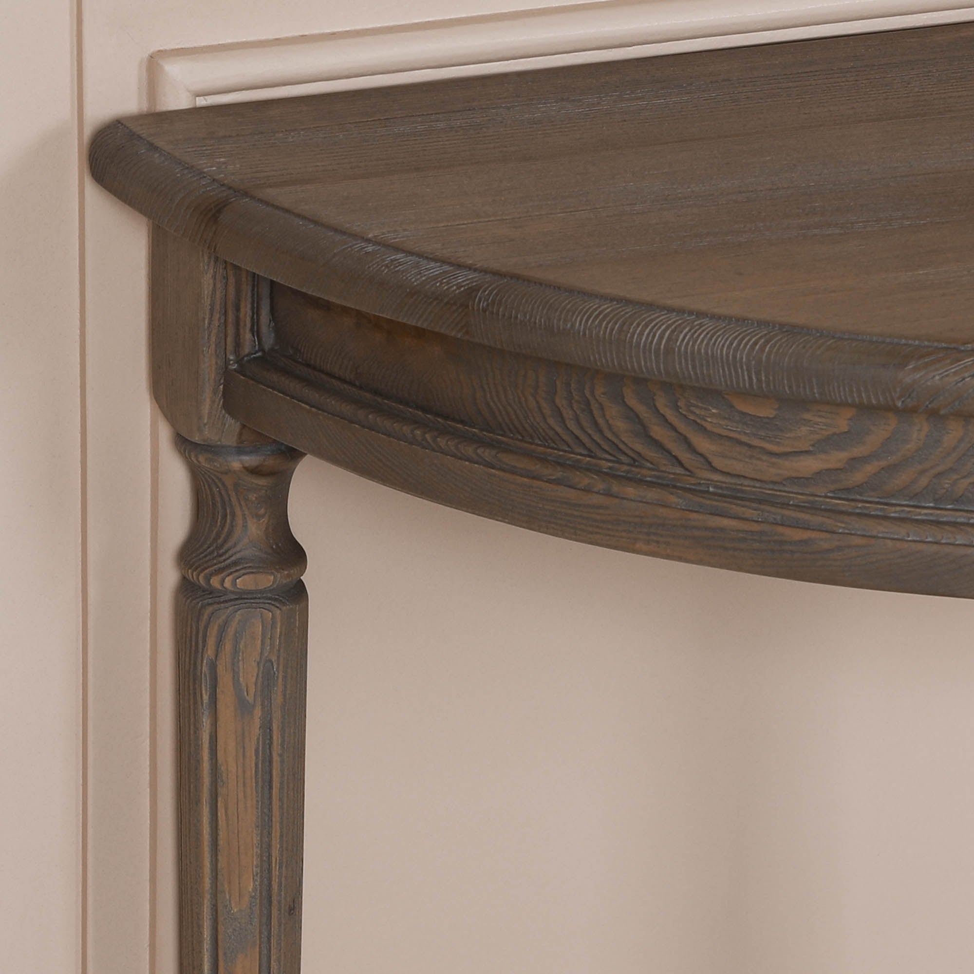 Close-up of Aveline rustic pine wood console table showing natural grain, distressed finish and turned leg detailing.