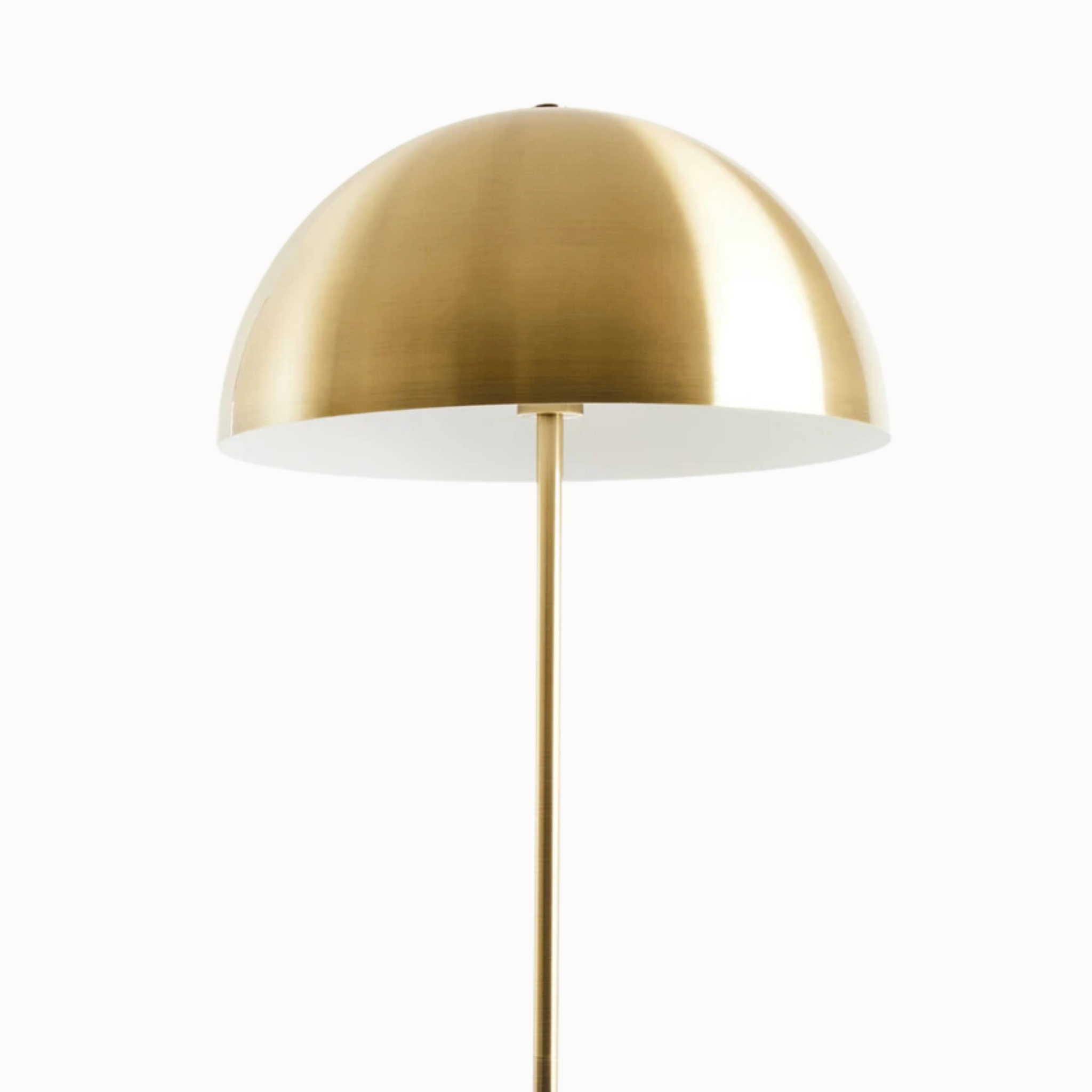 Benoît brushed brass dome floor lamp shown switched off against a plain white background.