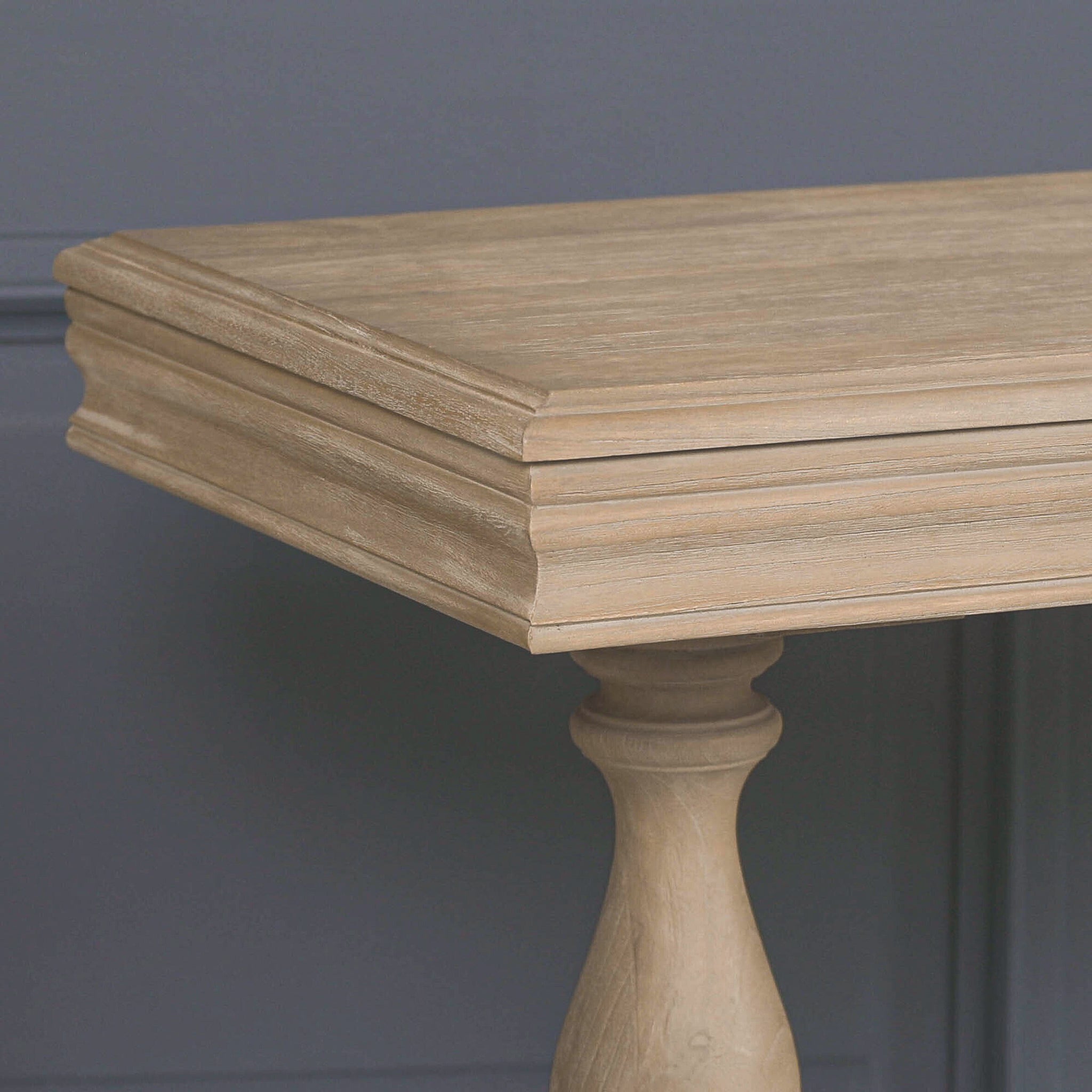 Close-up of the tabletop corner on the Camille Carved White Cedar Wood Console Table with Drawer, highlighting the layered moulded edge profile, rustic white cedar wood grain and premium handcrafted finish.