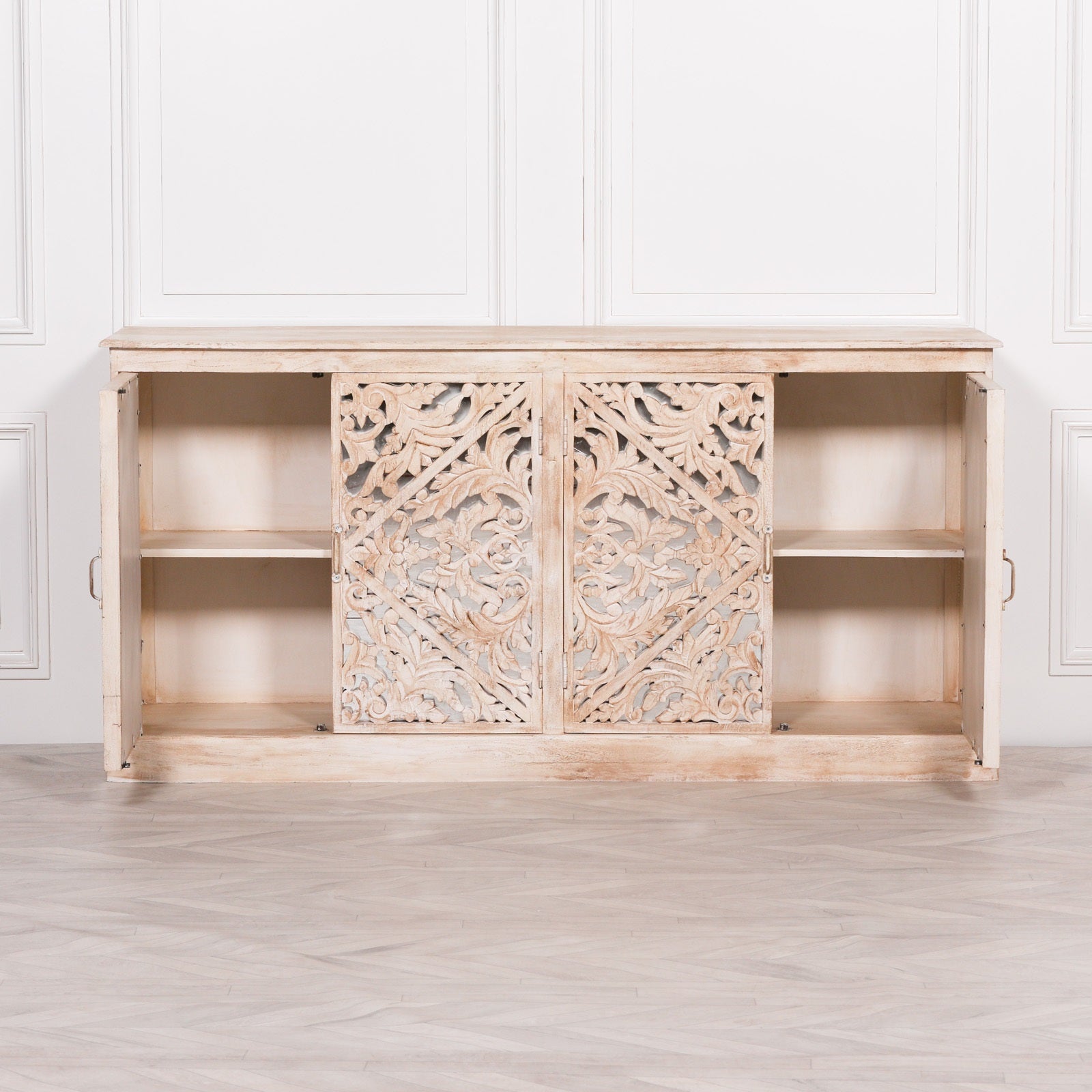 Camille Four Door Carved Mirrored Sideboard with cupboard doors open displaying adjustable internal shelving, handcrafted carved mirrored centre doors and practical concealed storage.