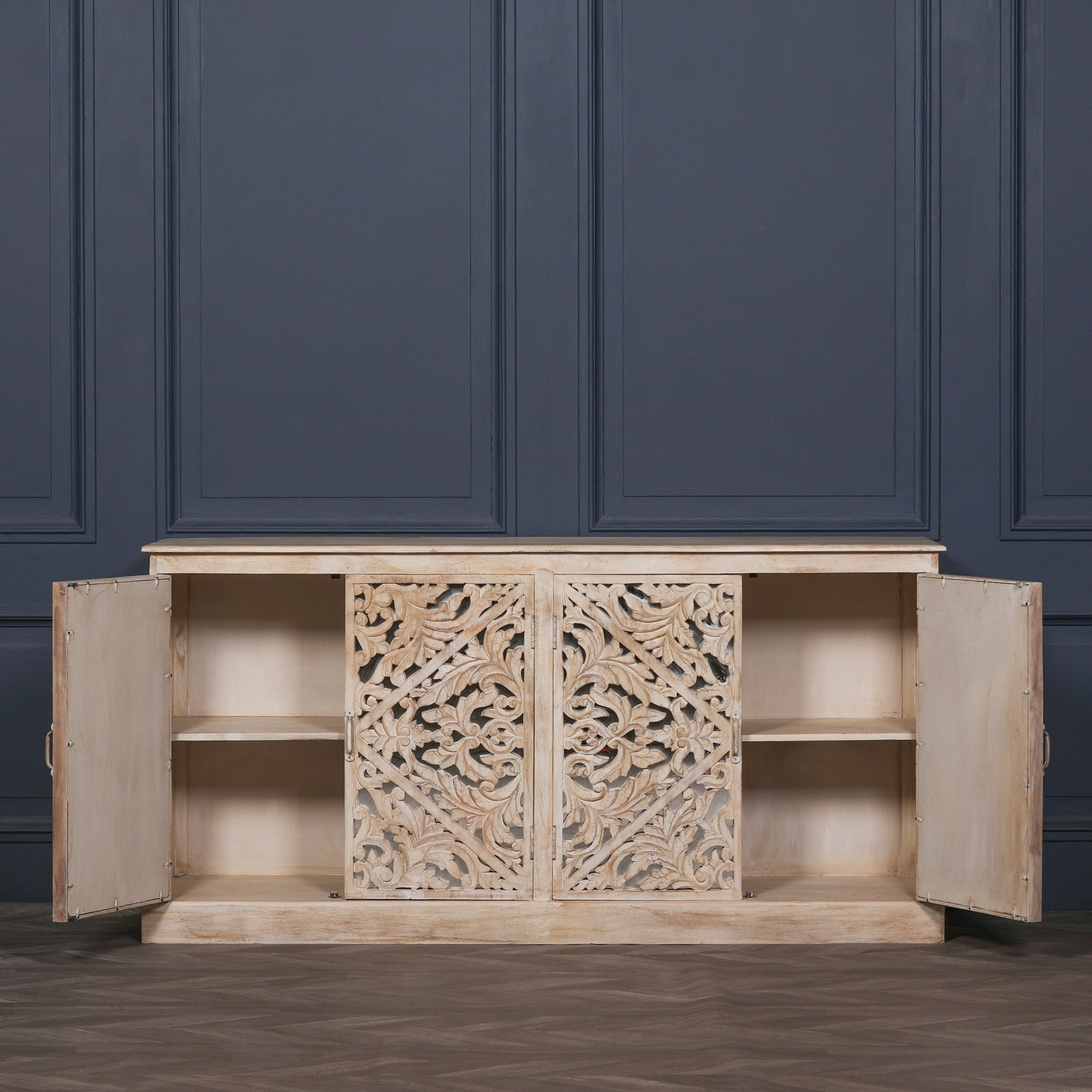 Camille Four Door Carved Mirrored Sideboard with outer cupboard doors open revealing spacious internal shelving for dining room storage, living room organisation and household essentials.