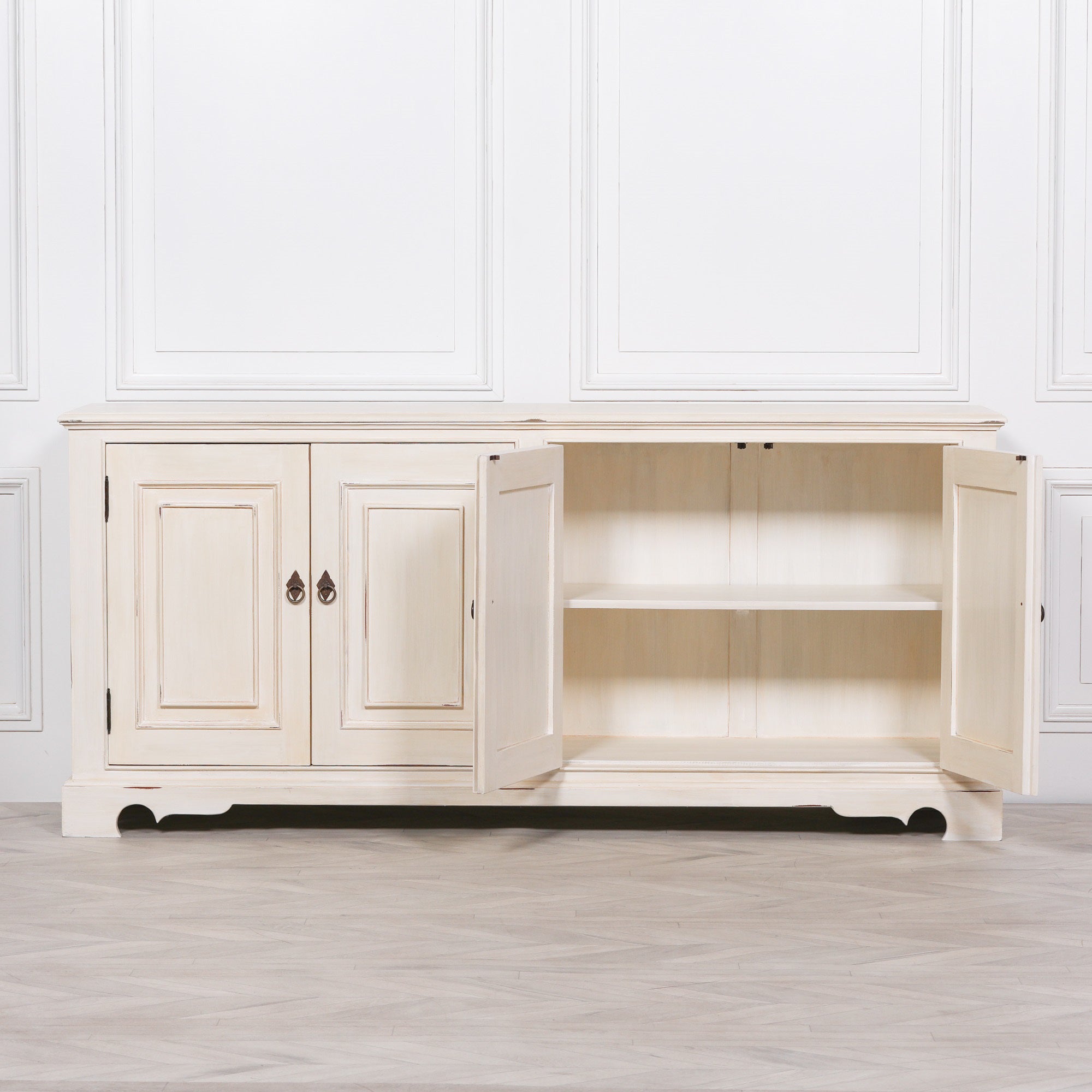 Camille Four Door Classical Sideboard with centre cupboard doors open, revealing adjustable internal shelving and generous concealed storage for dinnerware, serving pieces and everyday household organisation.