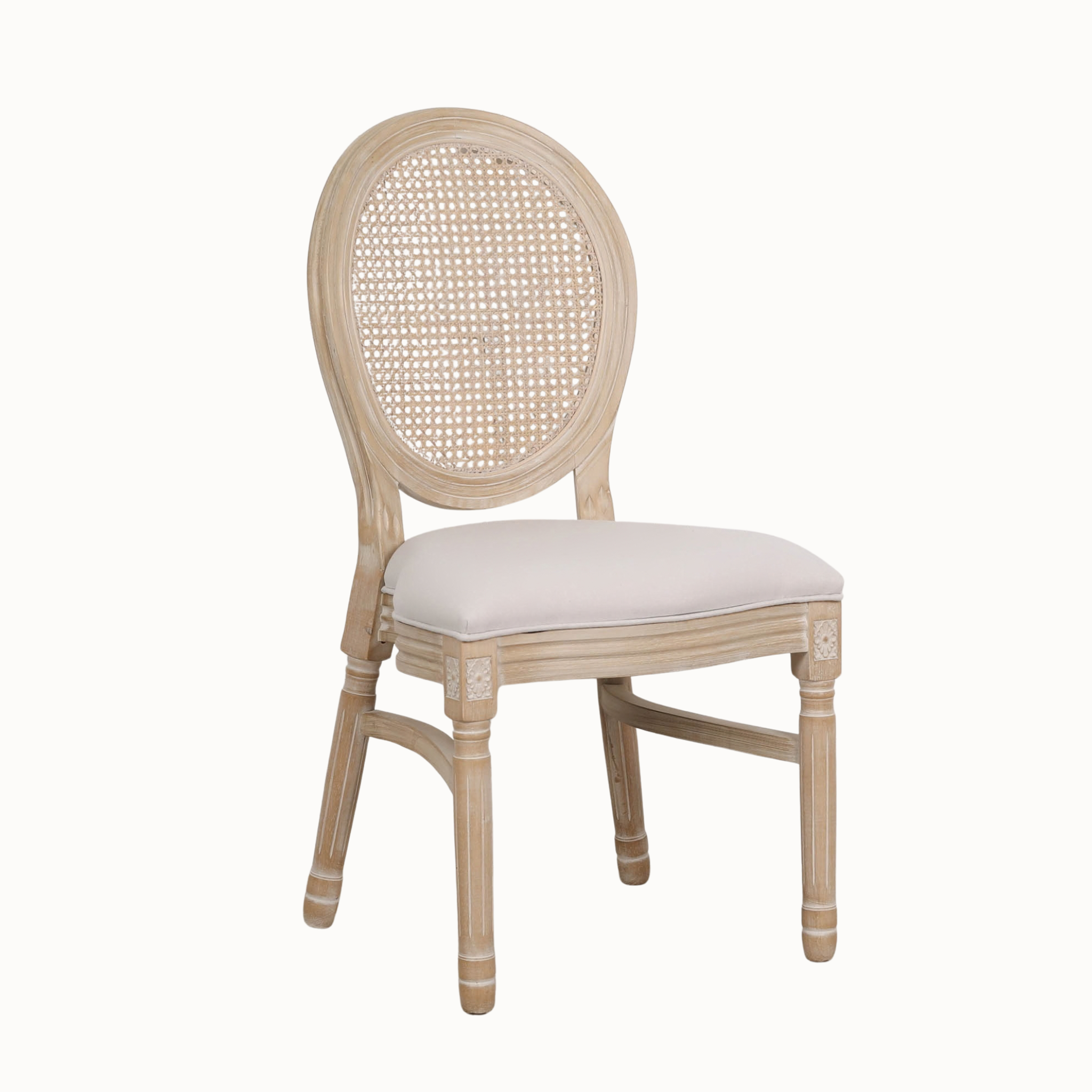 Camille French Louis linen dining chair with cane back and light washed wood frame on a plain white background.