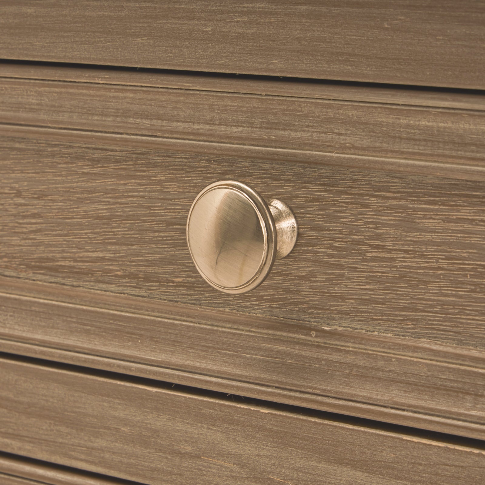Detailed close-up of the Camille grey wooden bedside table drawer featuring the brushed metal knob, painted wood grain, framed drawer front and premium craftsmanship, highlighting the quality finish and traditional styling.