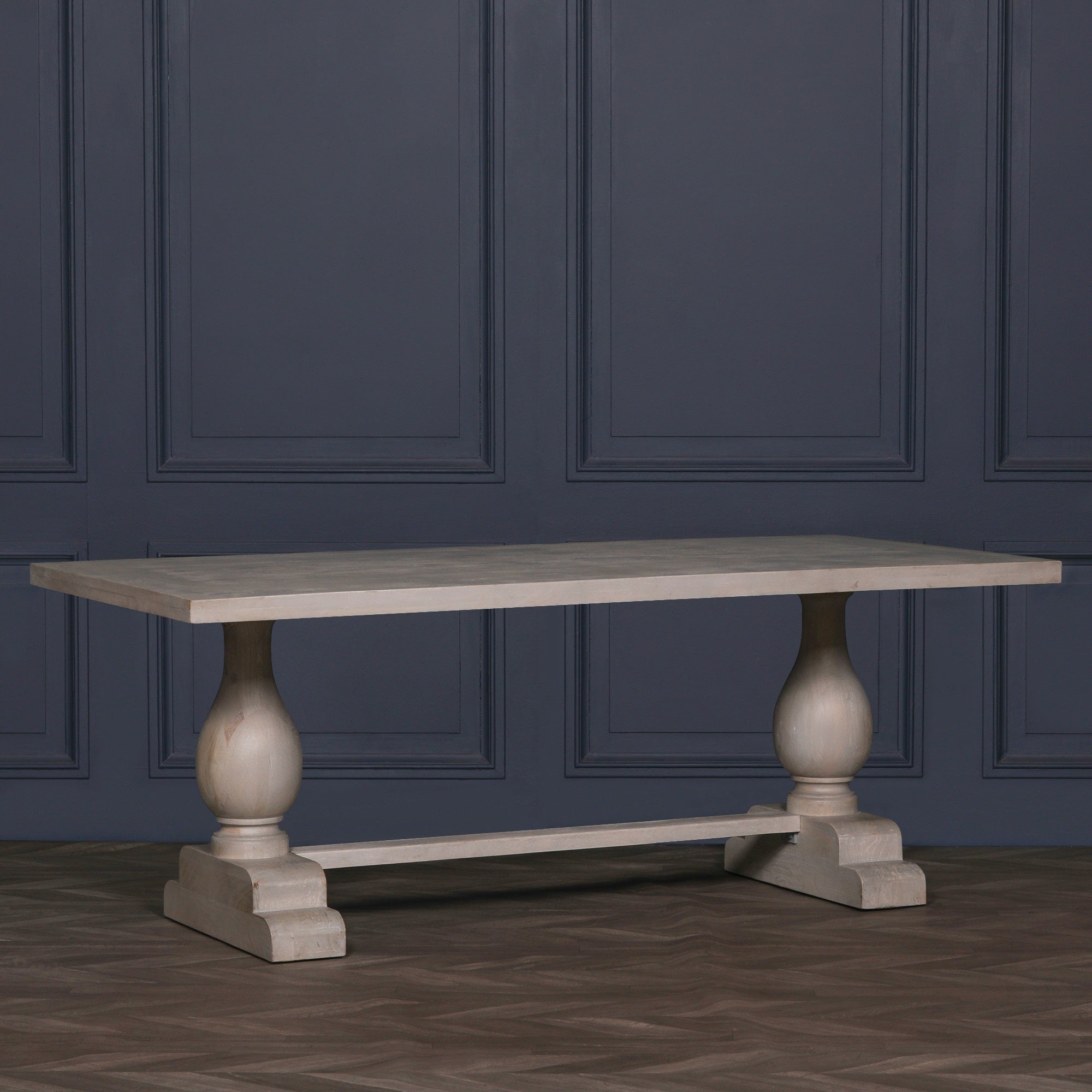 Side view of the Camille Large Rectangular Dining Table 210cm for 8–10 in Bleached Mango Wood showcasing the generous tabletop, double pedestal trestle base and handcrafted solid wood construction for large family dining rooms.
