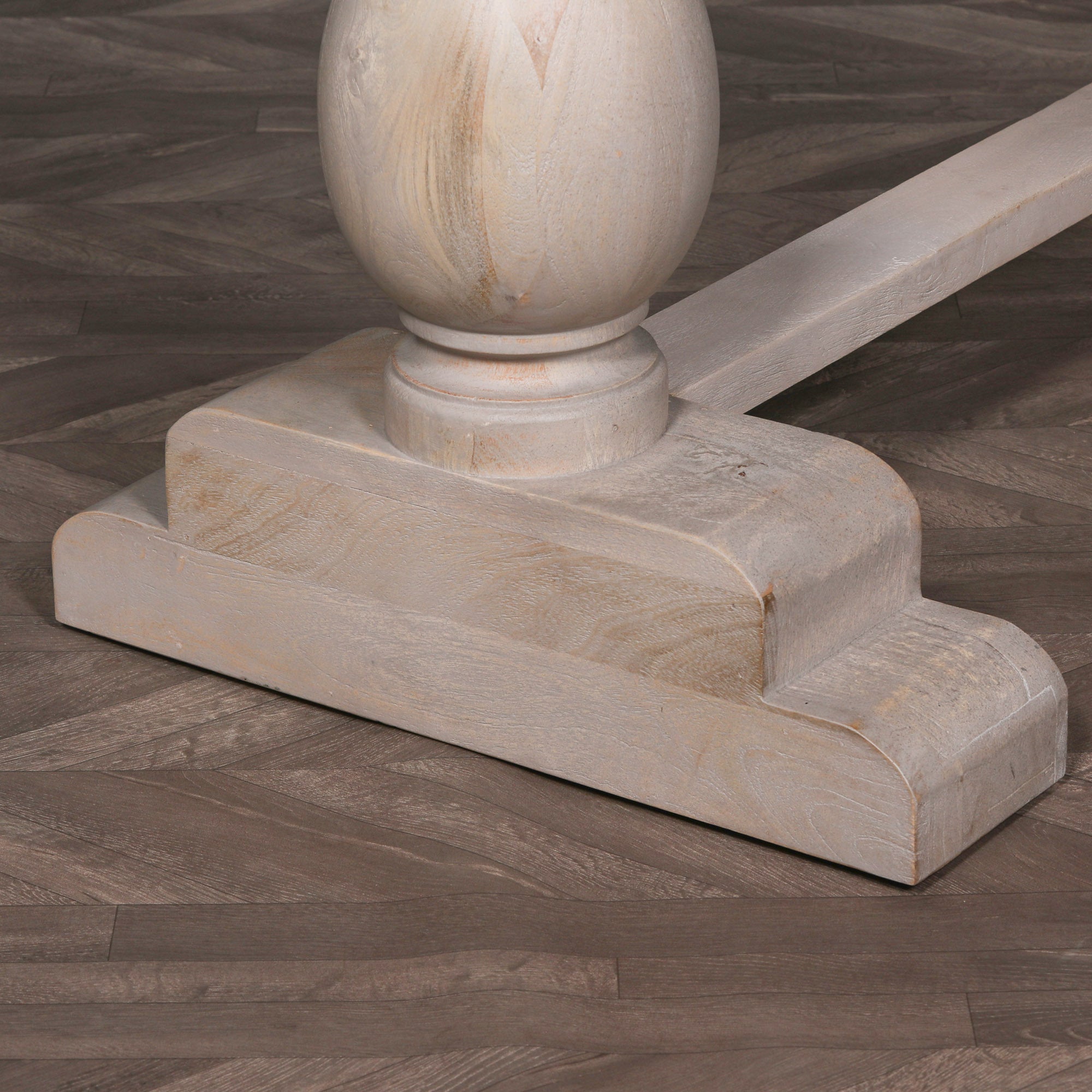 Close-up of the Camille Large Rectangular Dining Table 210cm turned pedestal leg and solid trestle base in Bleached Mango Wood, showcasing handcrafted detailing, natural wood grain and durable premium construction.