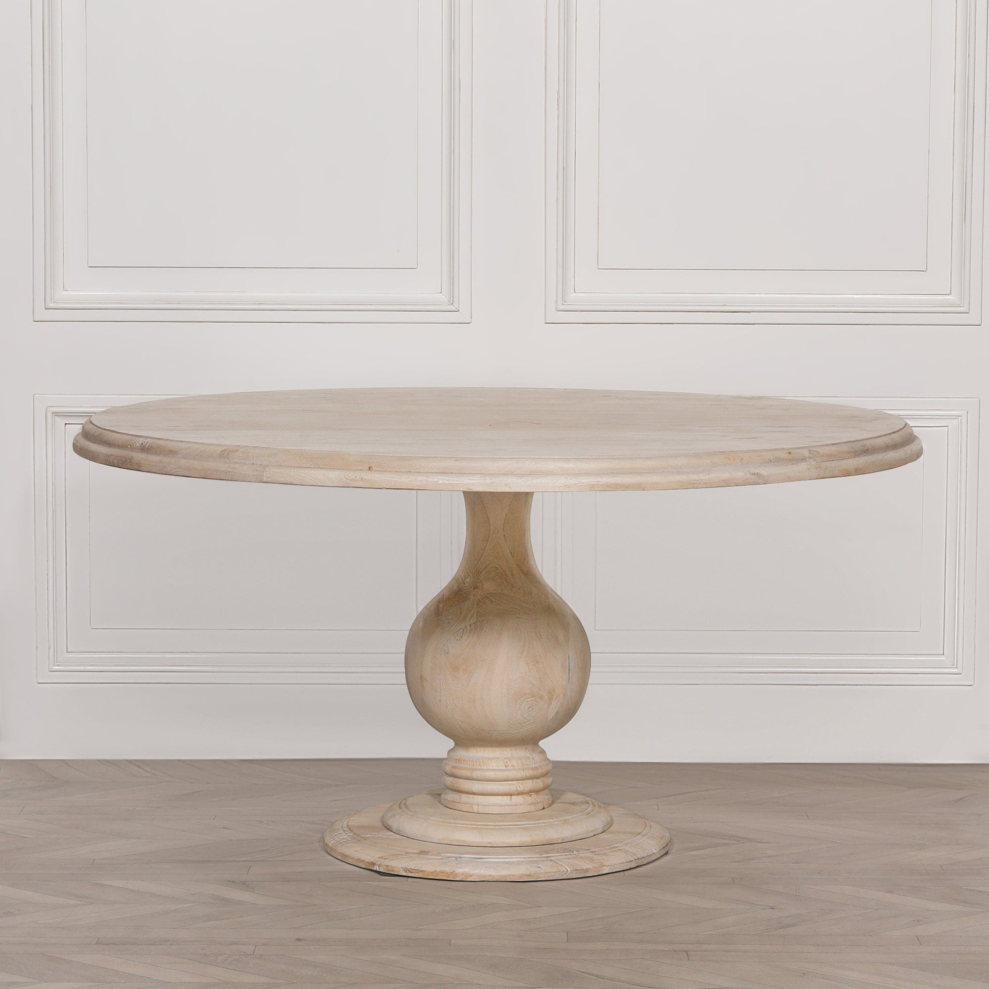 Front view of the Camille Round Pedestal Dining Table 152cm for 6 in Bleached Mango Wood featuring a generous round solid wood tabletop, elegant turned pedestal base and contemporary natural finish, perfect for modern, farmhouse and coastal dining spaces.