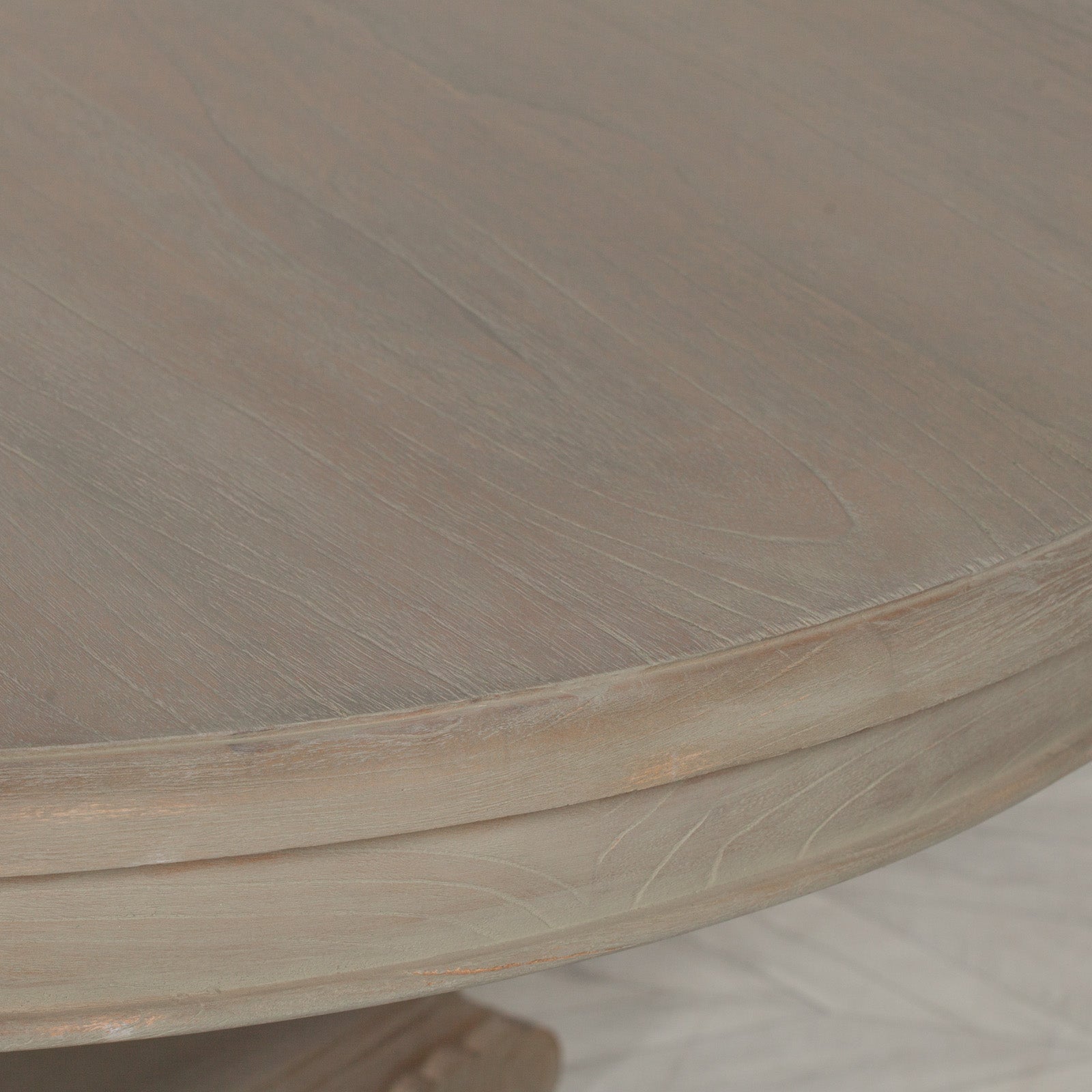 Detailed close-up of the Camille Round Pedestal Dining Table tabletop showcasing the natural Rustic White Cedar Wood grain, thick solid wood edge, smooth handcrafted finish and timeless round dining table design for everyday dining.