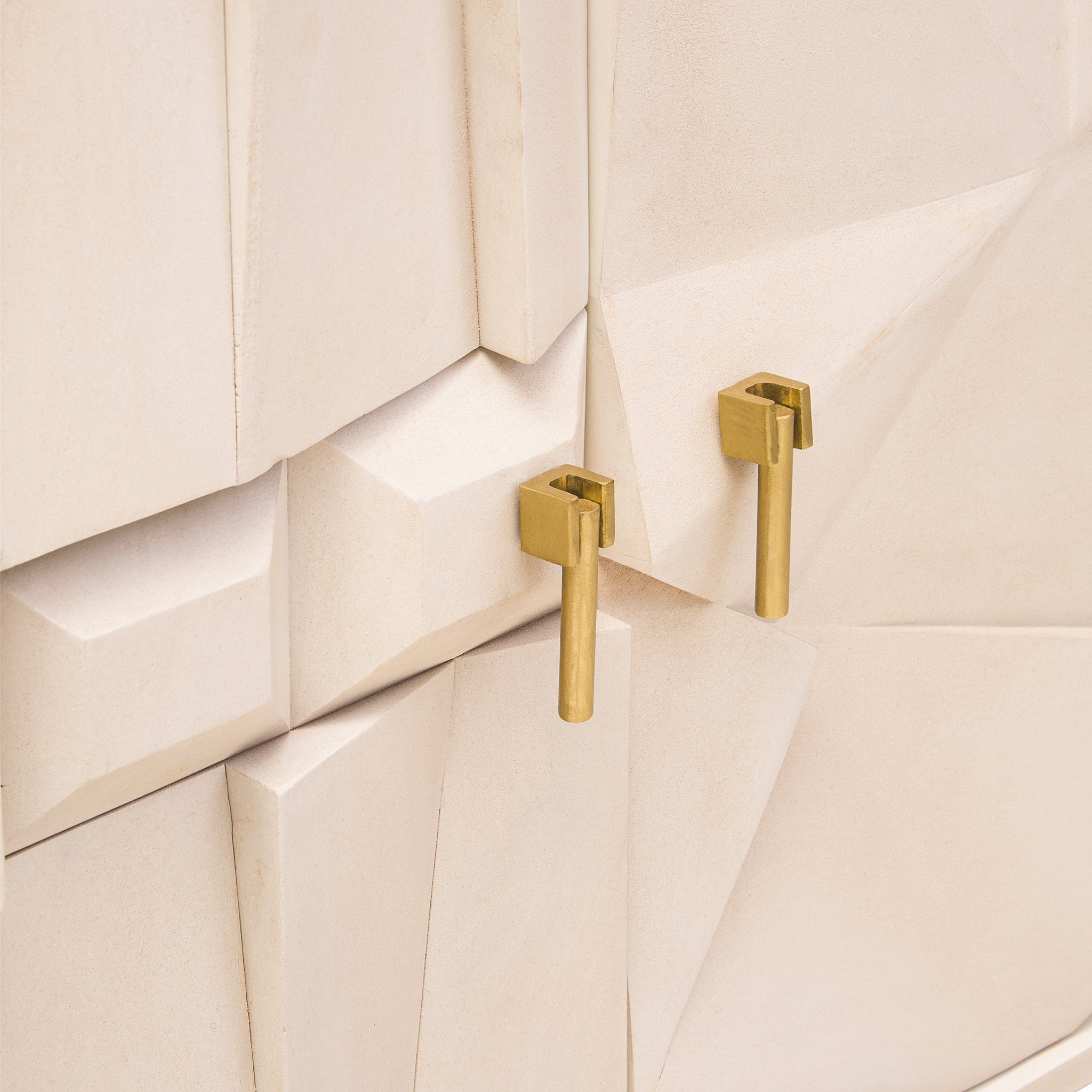 Close-up of brushed brass cabinet handles on the Camille Sideboard – Four Door Mango Wood, Whitewashed Finish with handcrafted geometric wood design.