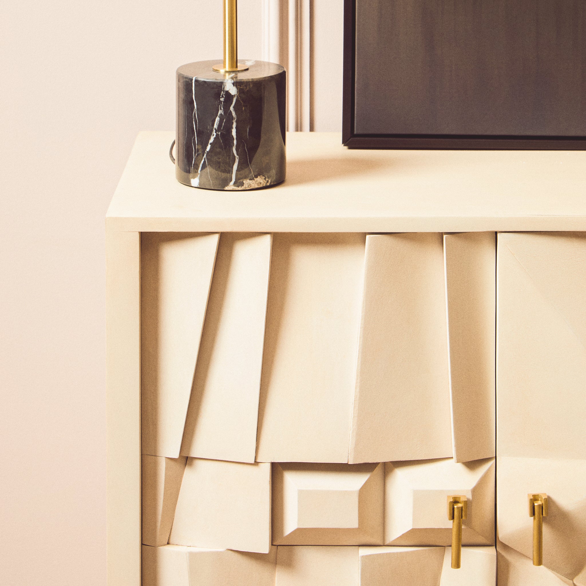 Detail of the Camille Sideboard – Four Door Mango Wood, Whitewashed Finish with decorative marble table lamp highlighting the textured handcrafted wood finish.