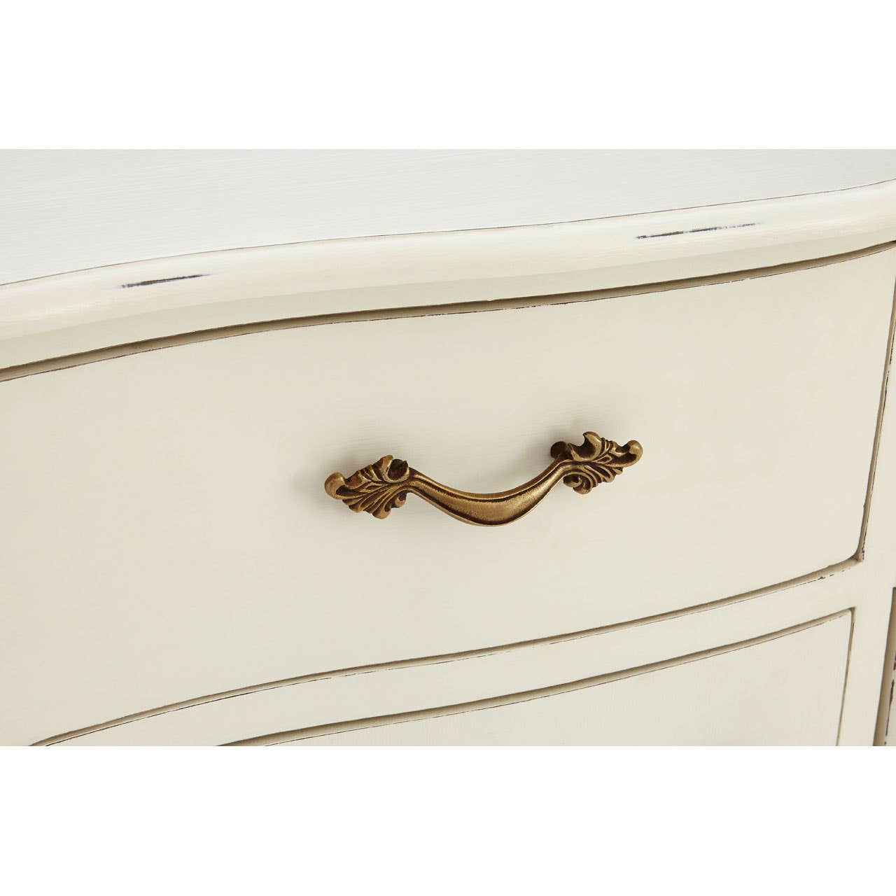 Detailed close-up of the Camille White Baroque Six Drawer Sideboard highlighting the antique brass drawer handle, curved drawer front, distressed white painted finish and traditional French-style craftsmanship.
