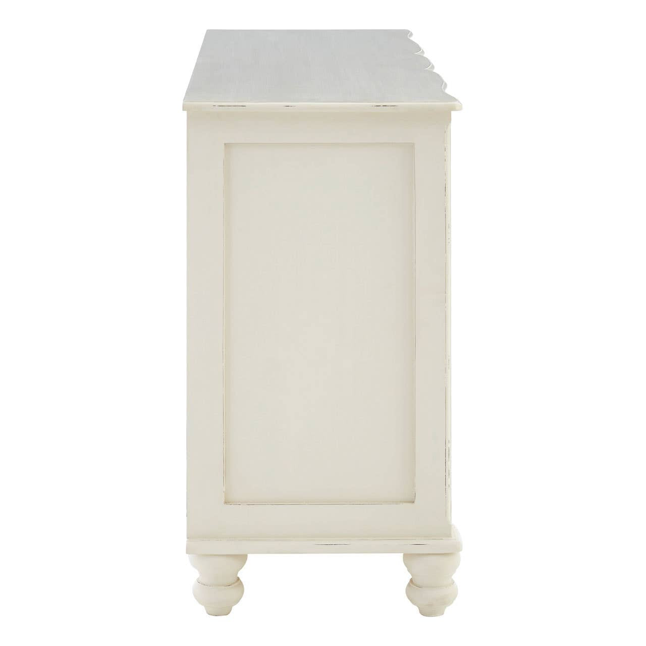 Side profile of the Camille White Baroque Six Drawer Sideboard highlighting its white painted finish, sturdy wooden construction, traditional panel detailing and classic French country furniture design.
