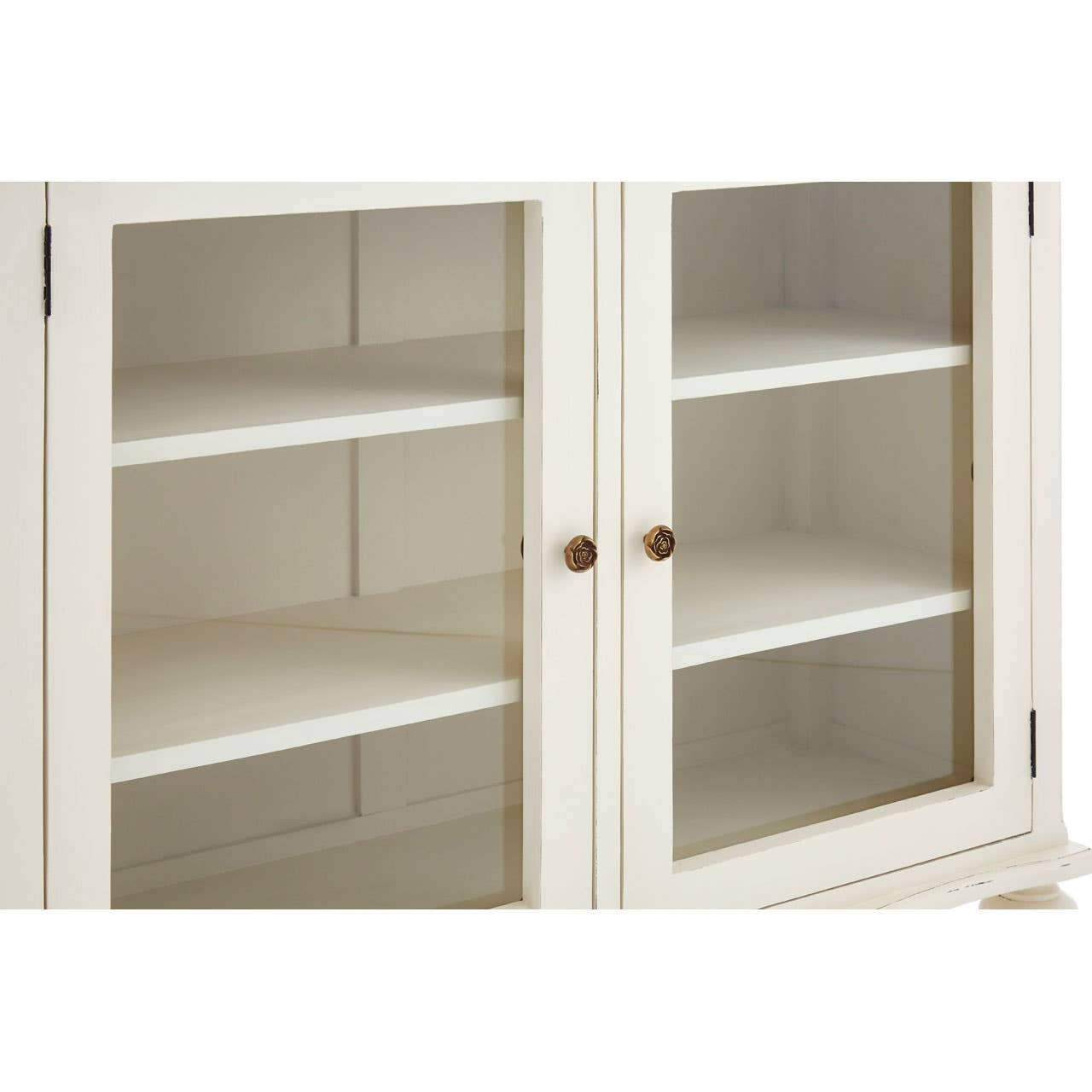 Detailed close-up of the Camille White Display Cabinet featuring the glazed display doors, painted wooden frame, spacious shelving and elegant French-inspired cabinet design.