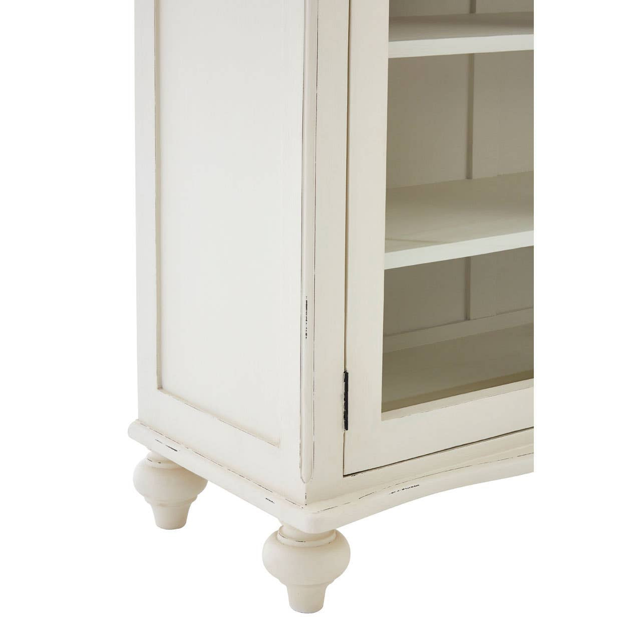Close-up of the Camille White Display Cabinet highlighting the handcrafted lower corner, painted wood finish, turned feet, glazed cabinet door and traditional French country furniture craftsmanship.