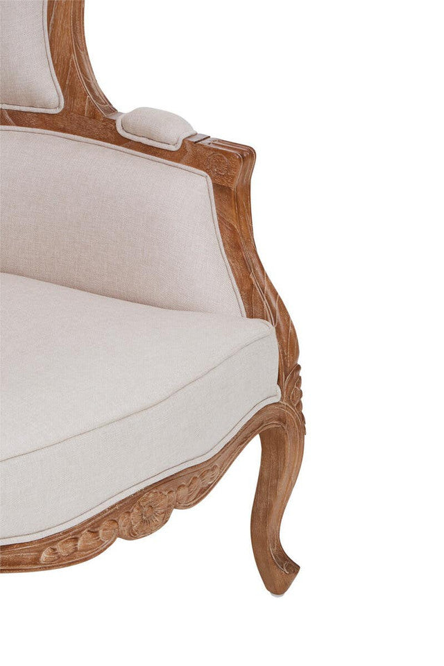 Close-up of the Colette Cream Dome Accent Chair with Canopy Back & Cabriole Legs showing the carved wooden armrest, upholstered cream fabric, decorative apron detailing and elegant cabriole leg.