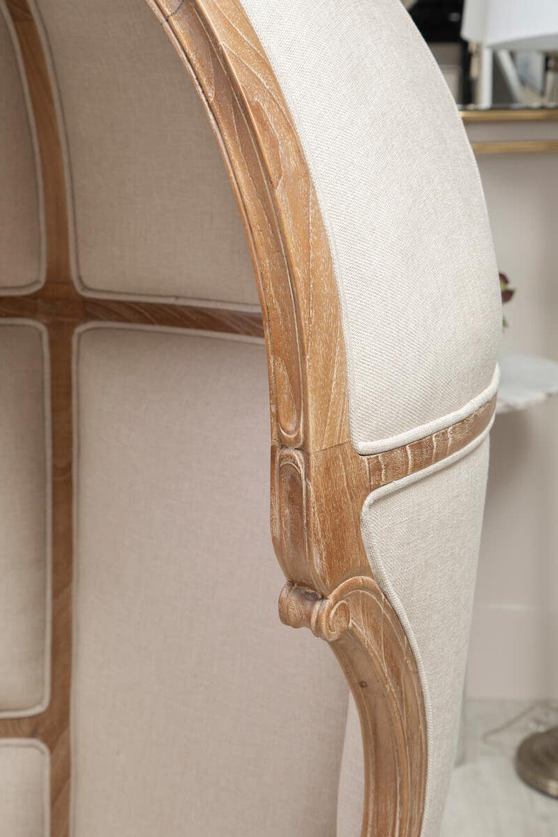 Close-up rear detail of the Colette Cream Dome Accent Chair with Canopy Back & Cabriole Legs showcasing the handcrafted carved wooden frame, upholstered cream fabric panels and premium furniture craftsmanship.