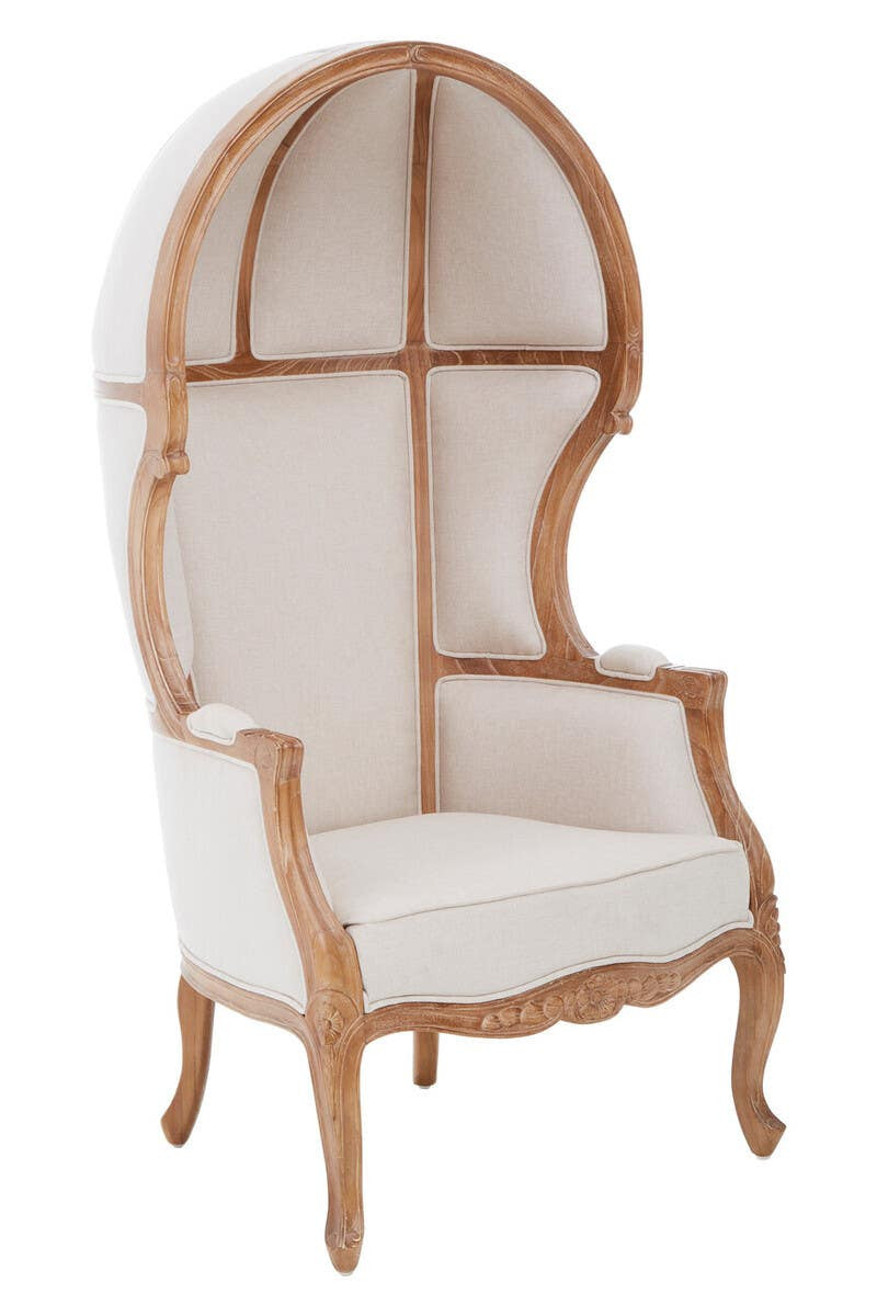 Three-quarter front view of the Colette Cream Dome Accent Chair with Canopy Back & Cabriole Legs highlighting the sculptural canopy silhouette, cream upholstered panels, carved wooden detailing and traditional cabriole legs.
