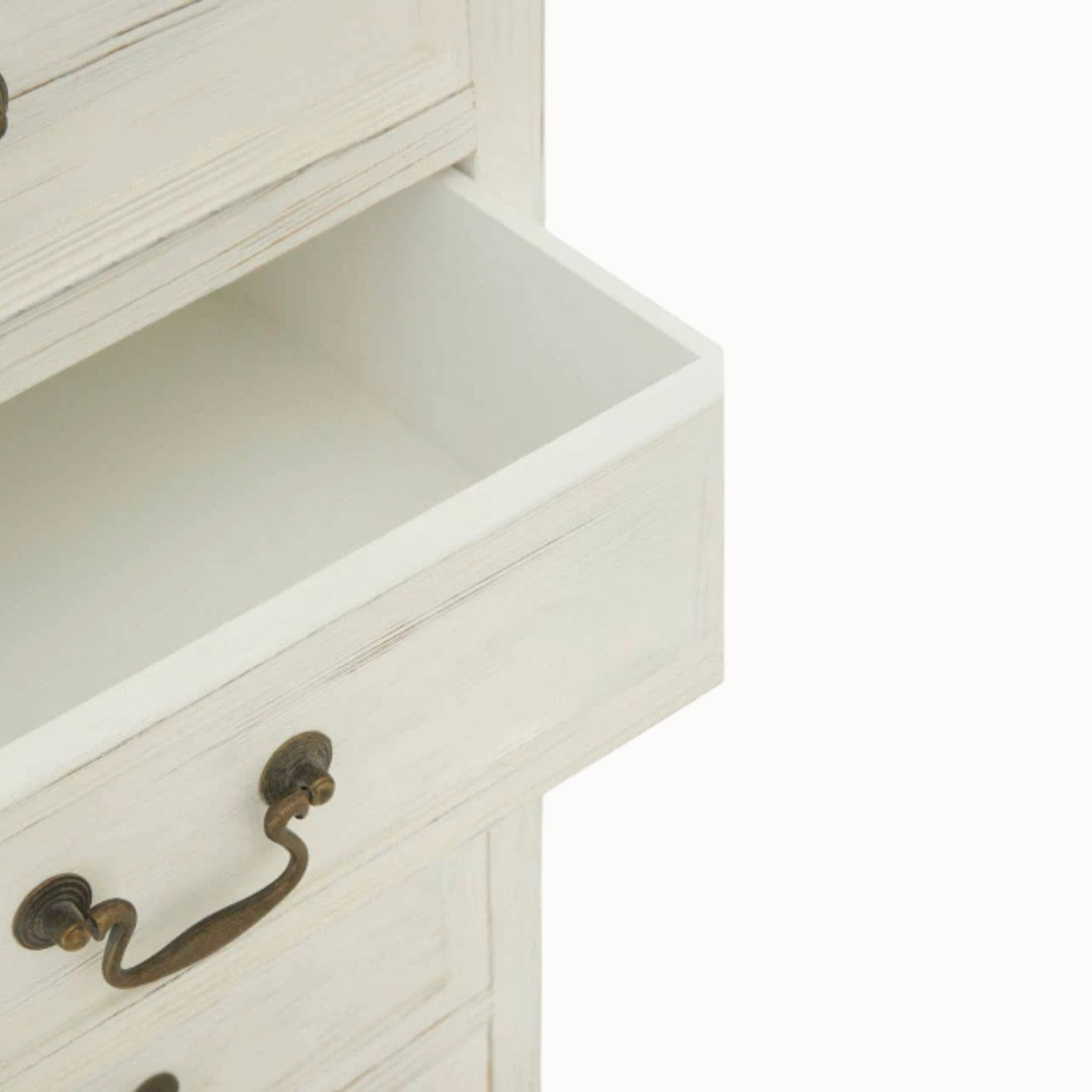 Close-up of Coralie washed ivory tallboy with open drawer and antique metal handle against a plain white background.