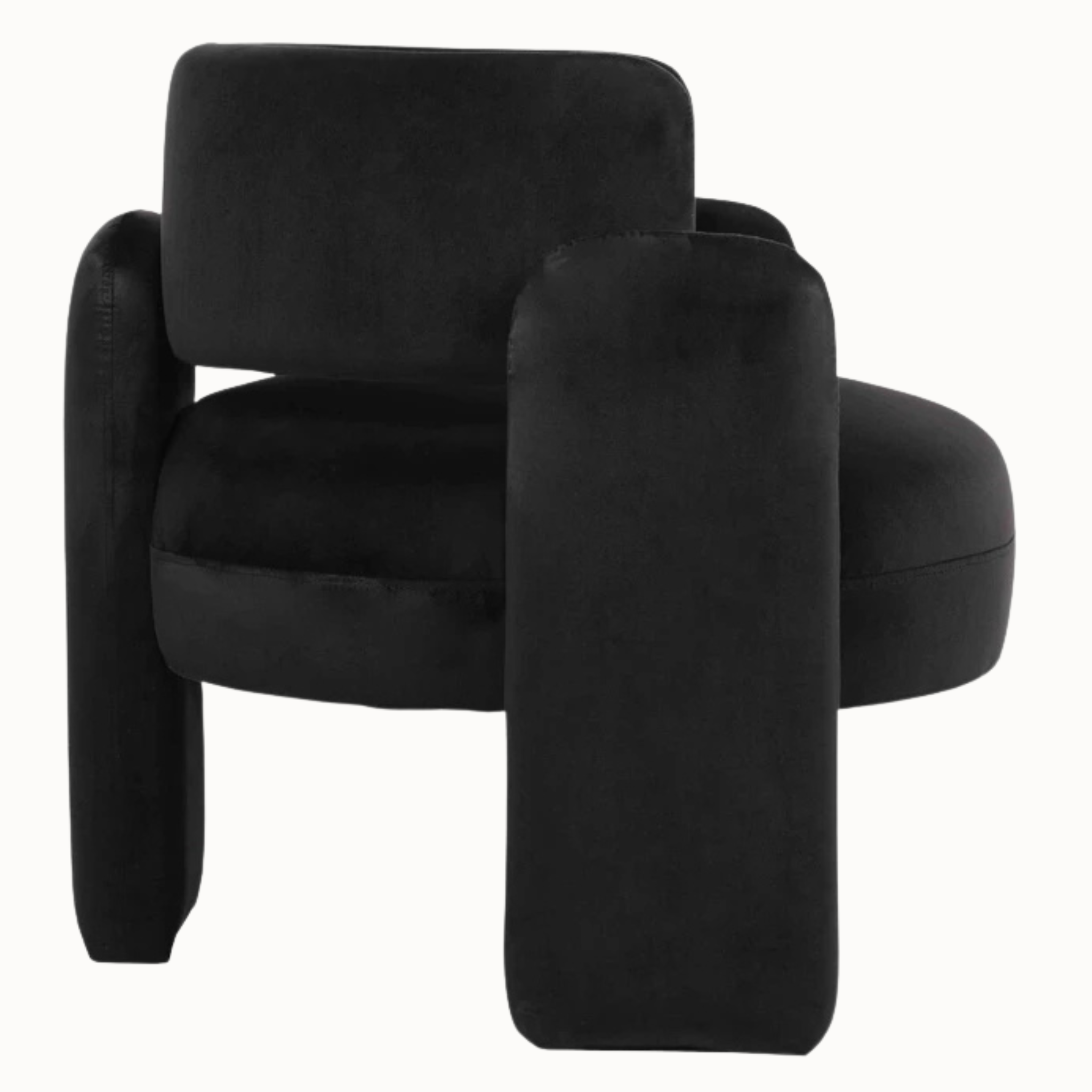 Side view of Élise black velvet curved open back chair showing its sculptural frame on a plain white background.