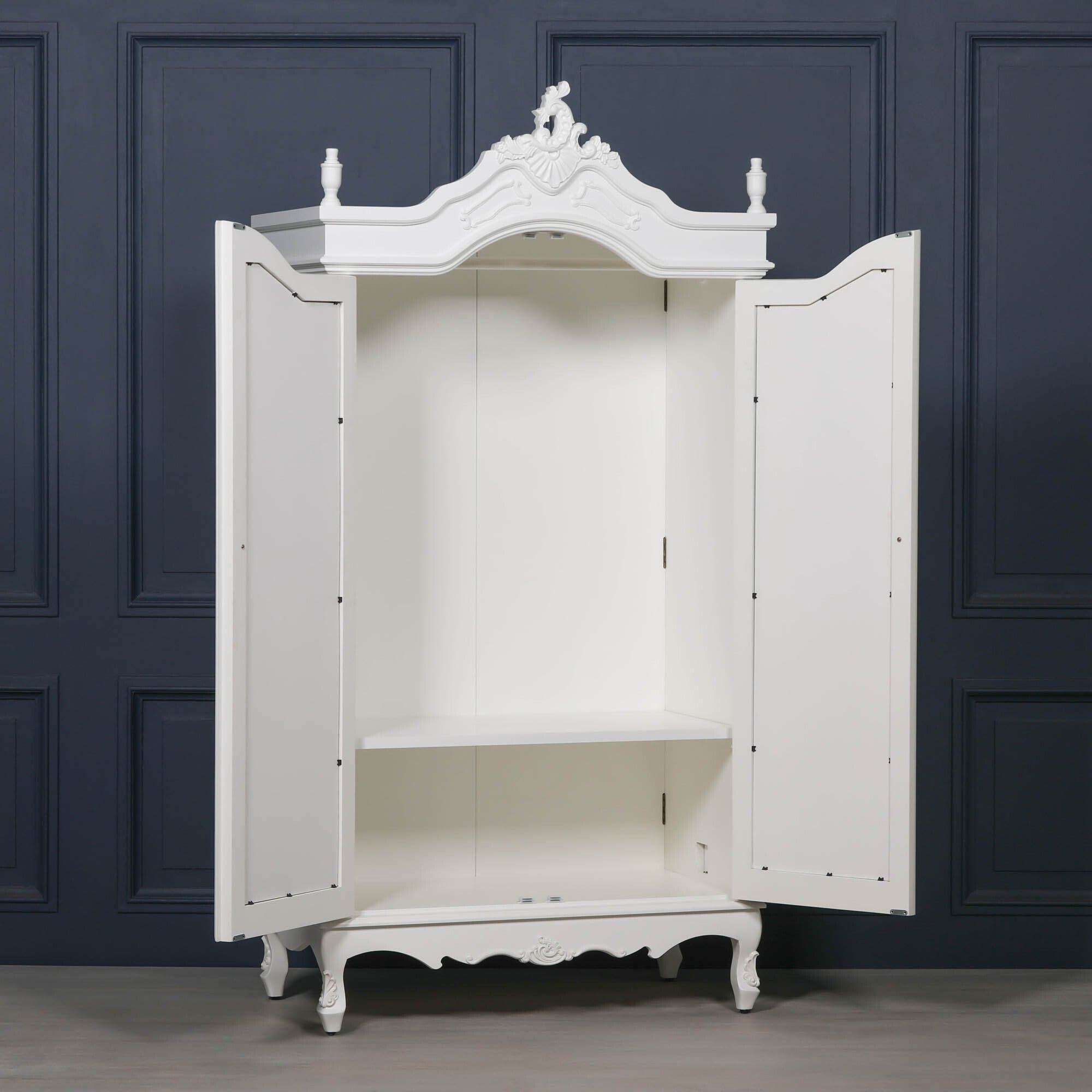 Élodie White Mirrored Double Door Armoire Wardrobe with doors open revealing the spacious hanging rail, internal storage shelf and generous wardrobe interior, combining French Rococo elegance with practical bedroom organisation.