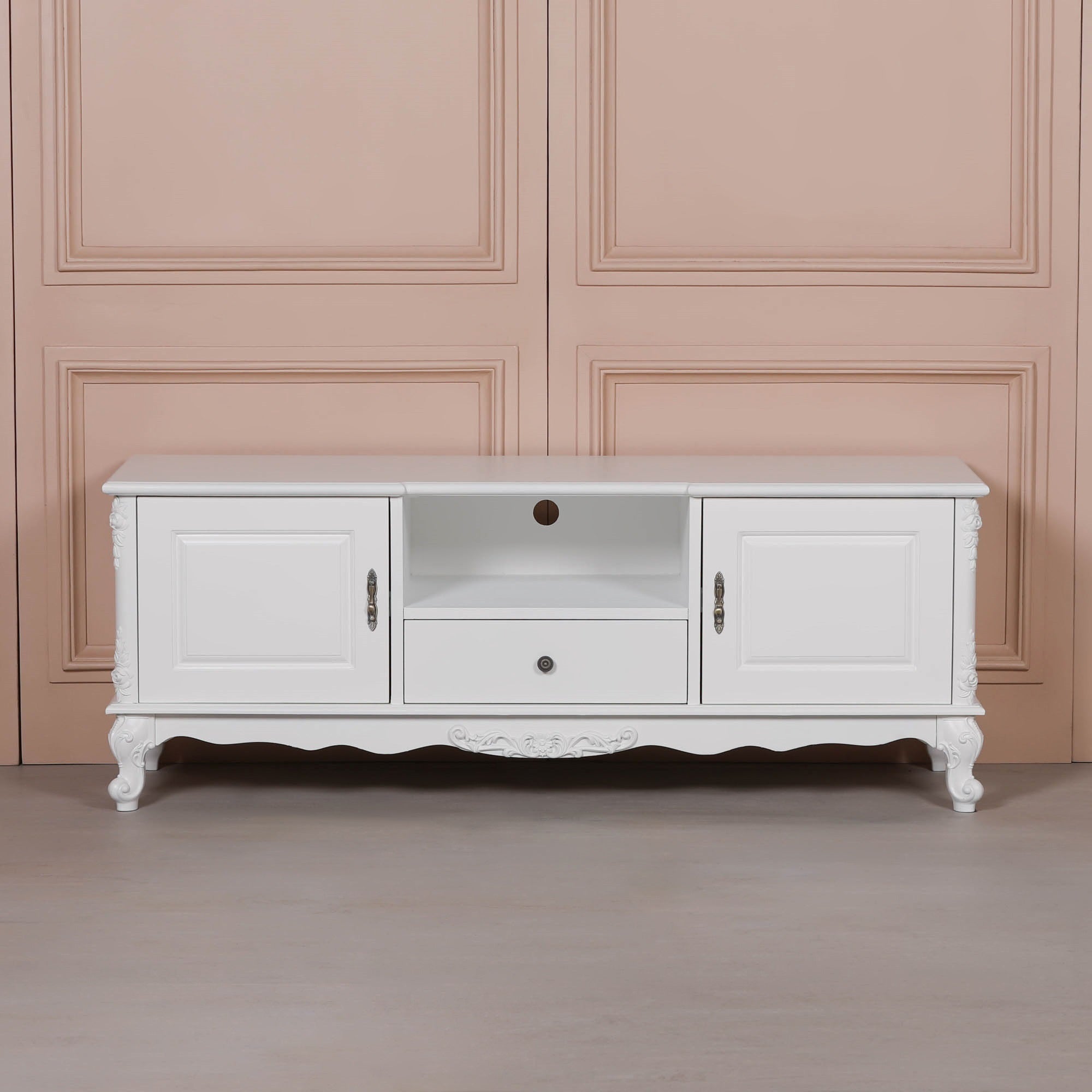 Front view of the Éloise Large French White TV Cabinet with Hand-Carved Detailing showcasing two cupboard doors, open media shelf, central drawer, cable management hole and timeless French-inspired craftsmanship.