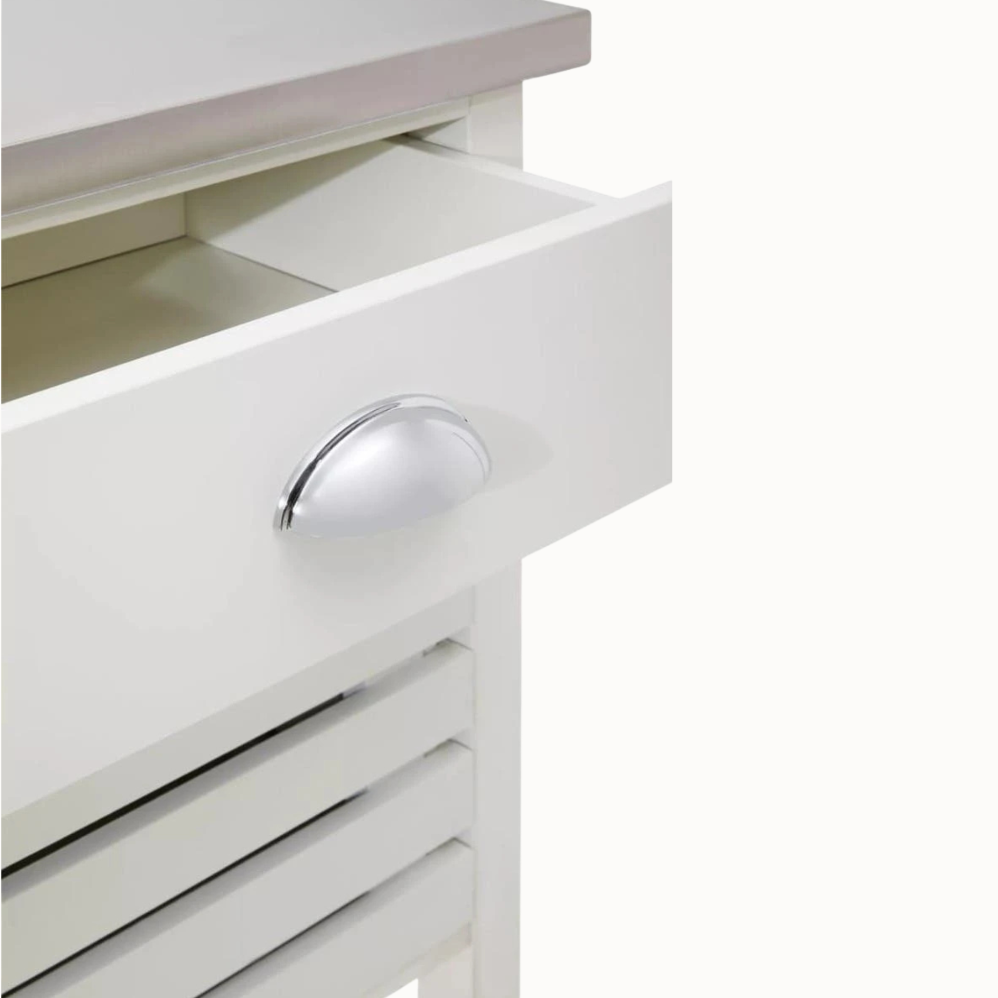 Close-up of Étienne cream kitchen trolley drawer with silver cup handle and slatted basket on white.