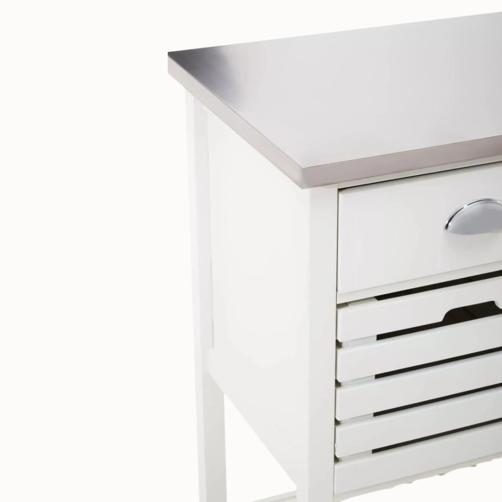 Close-up of cream kitchen trolley with stainless steel top, drawer and slatted storage basket on white.