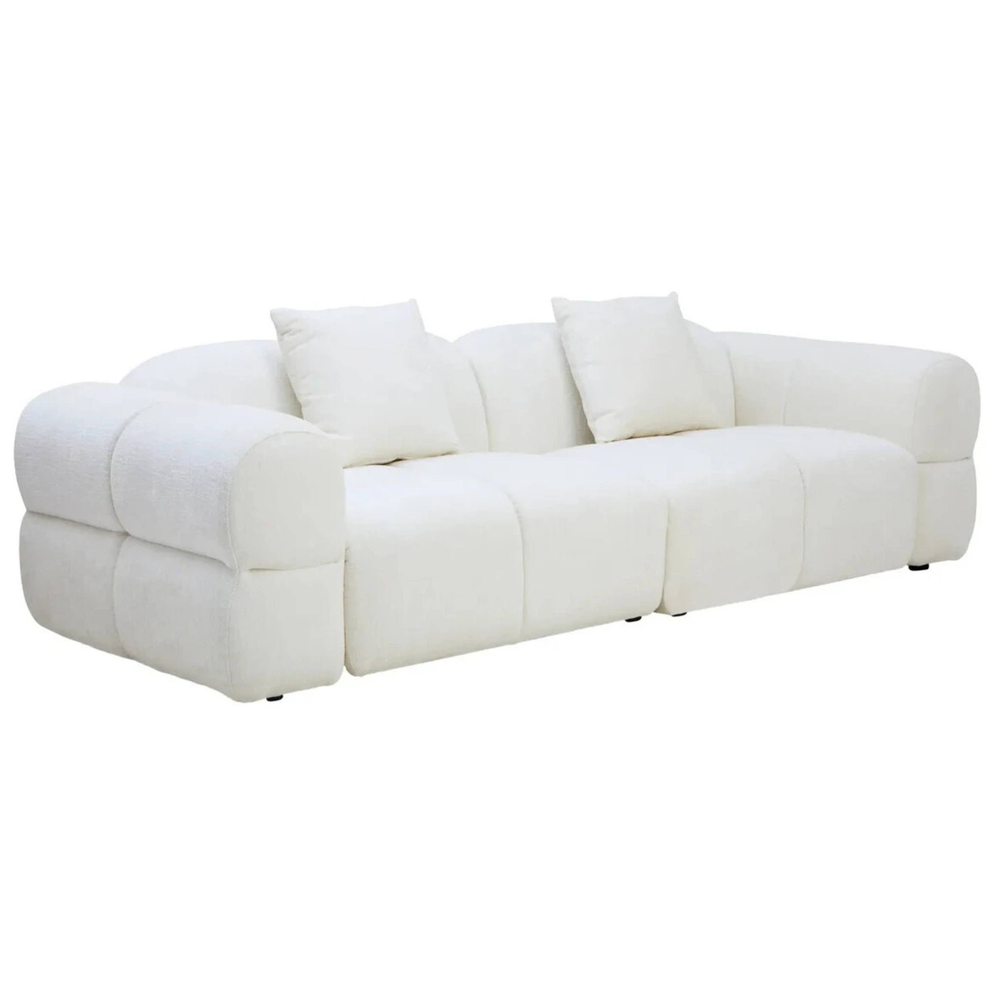 Éveline large cream textured fabric 3 seater sofa angled view with rounded arms and cushions on a white background.