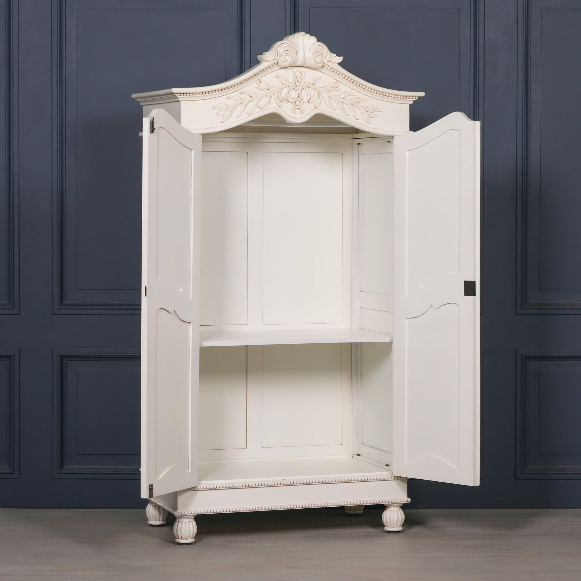 Geneviève Hand-Carved French Chateau Double Door Armoire Wardrobe with doors open revealing spacious interior storage, adjustable shelving and hanging space for organised luxury bedroom storage.