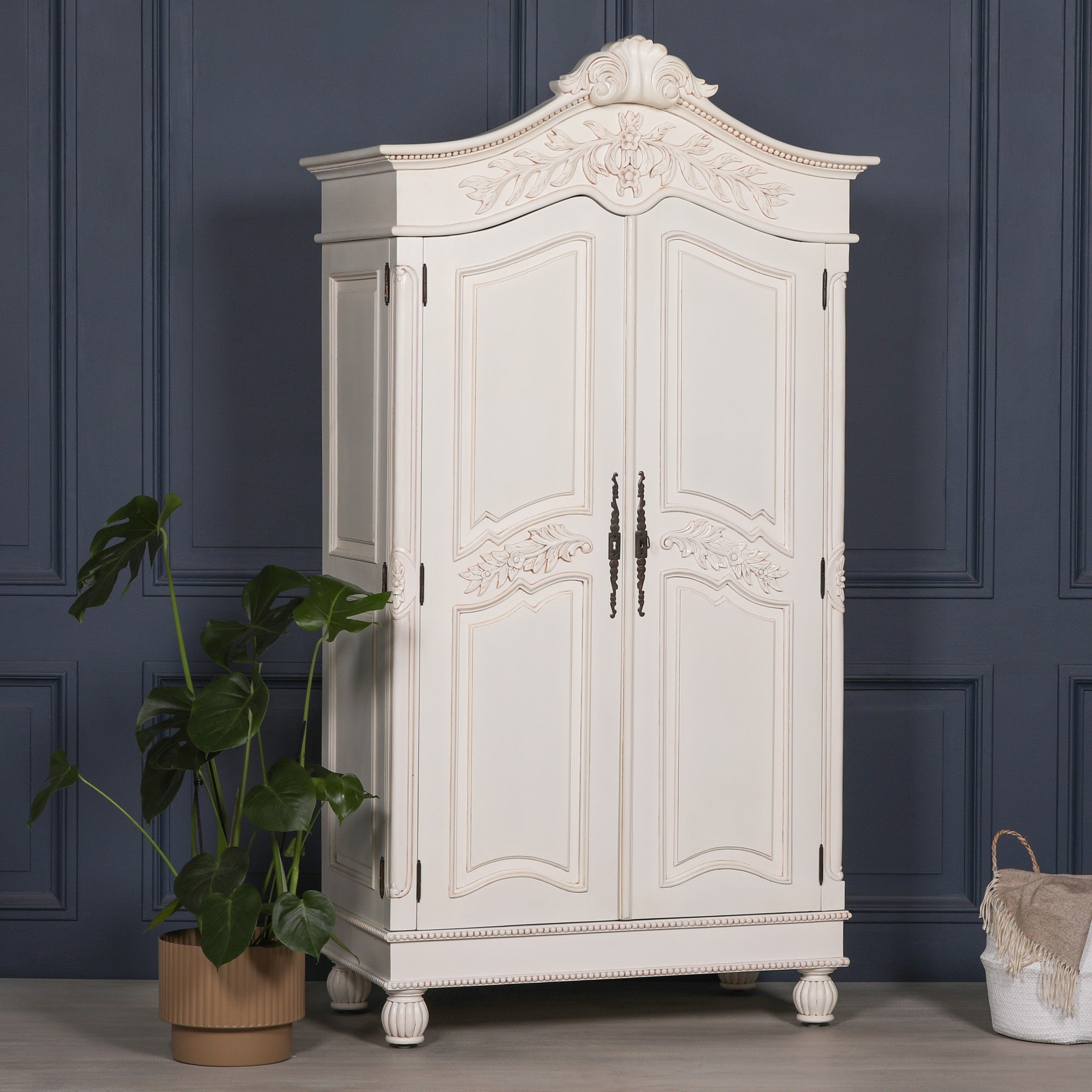 Geneviève Hand-Carved French Chateau Double Door Armoire Wardrobe in White Mahogany featuring ornate floral carvings, elegant French provincial styling, solid mahogany construction and spacious bedroom storage in a luxury interior.