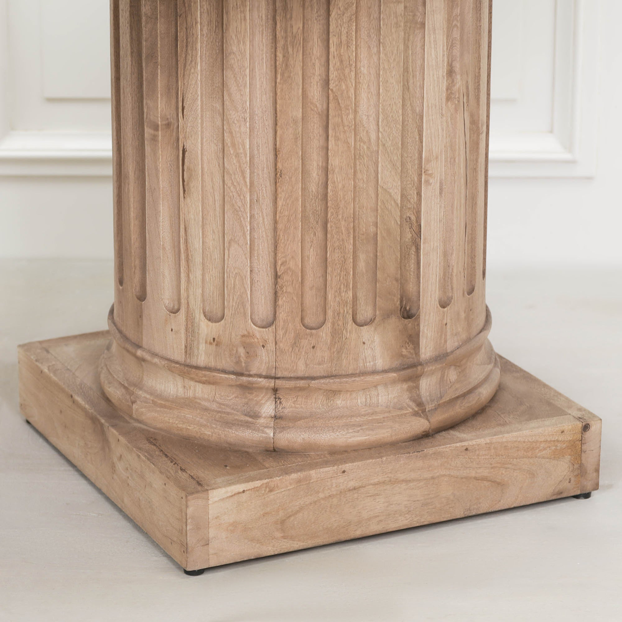Close-up of the fluted column pedestal base on the Henri 220cm Rustic Mango Wood Rectangular Column Dining Table, highlighting the solid mango wood grain, handcrafted detailing, rustic finish and substantial square plinth base.