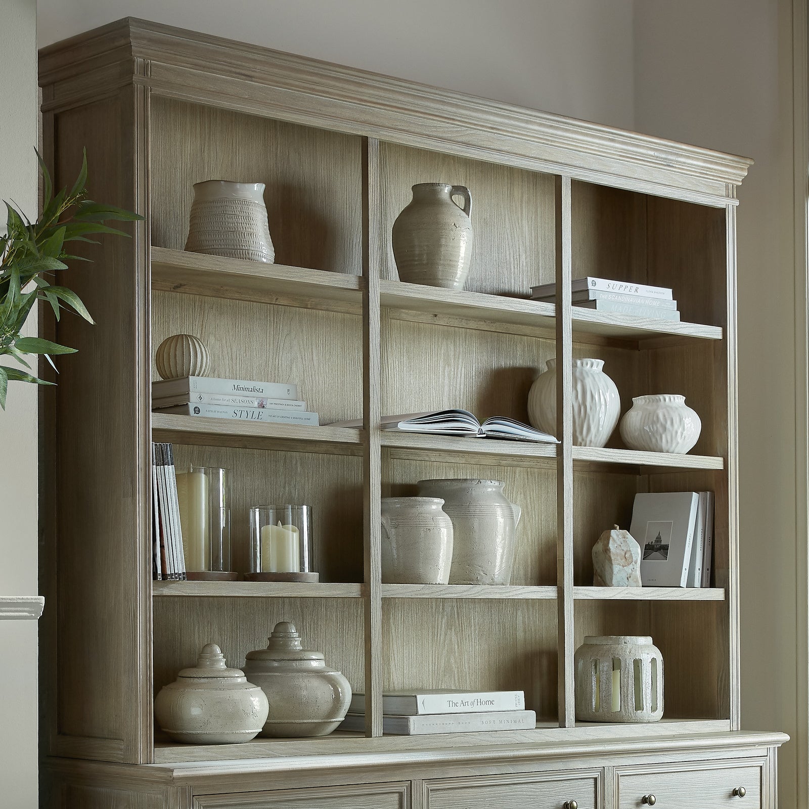 Close-up of the Laurent Large Open Display Shelving Unit styled with decorative ceramic vases, books and home accessories, showcasing spacious open shelving, natural wood grain and timeless farmhouse-inspired display storage.